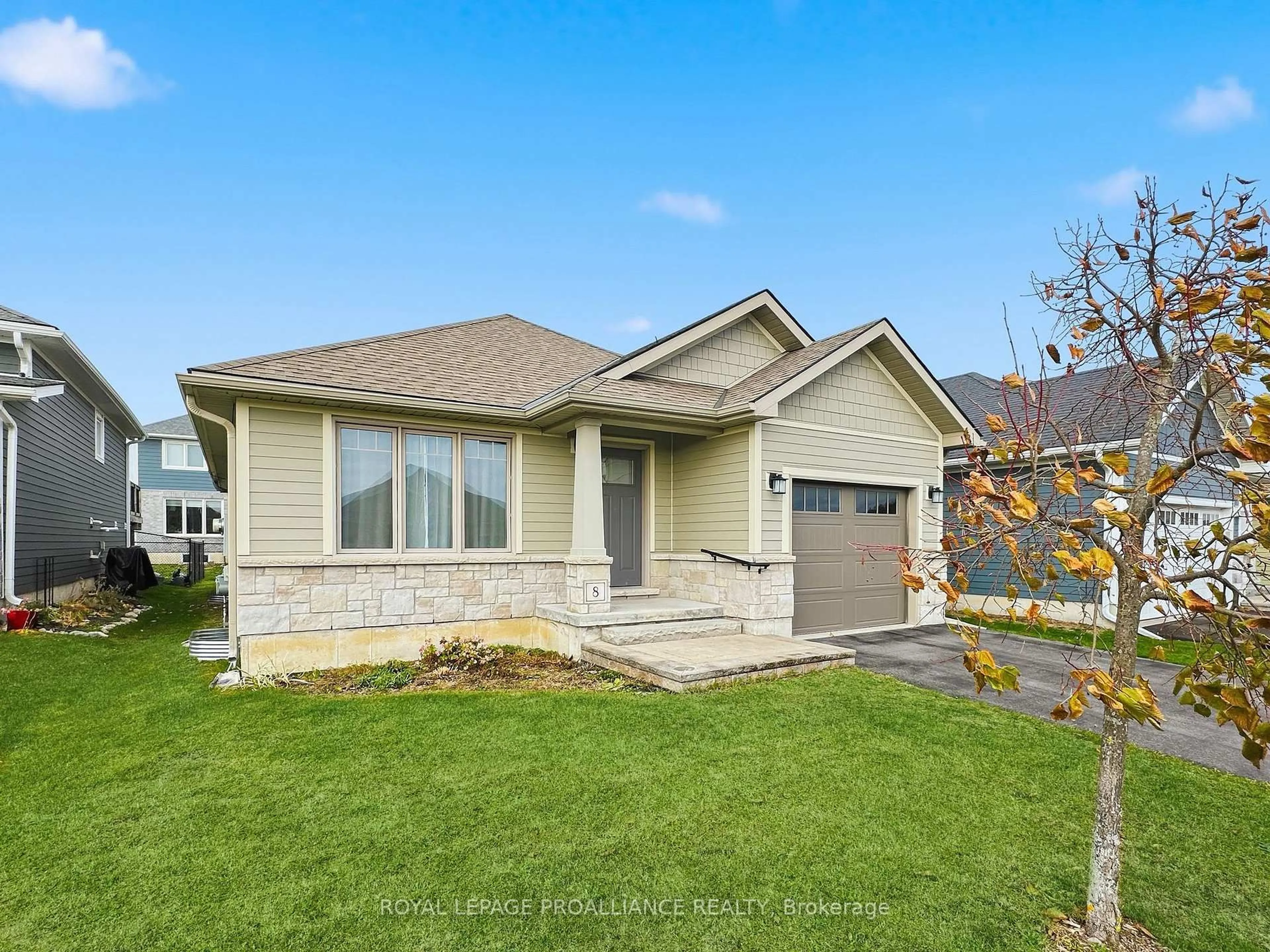 Home with vinyl exterior material, street for 8 Tessa Blvd, Belleville Ontario K8N 4Z5