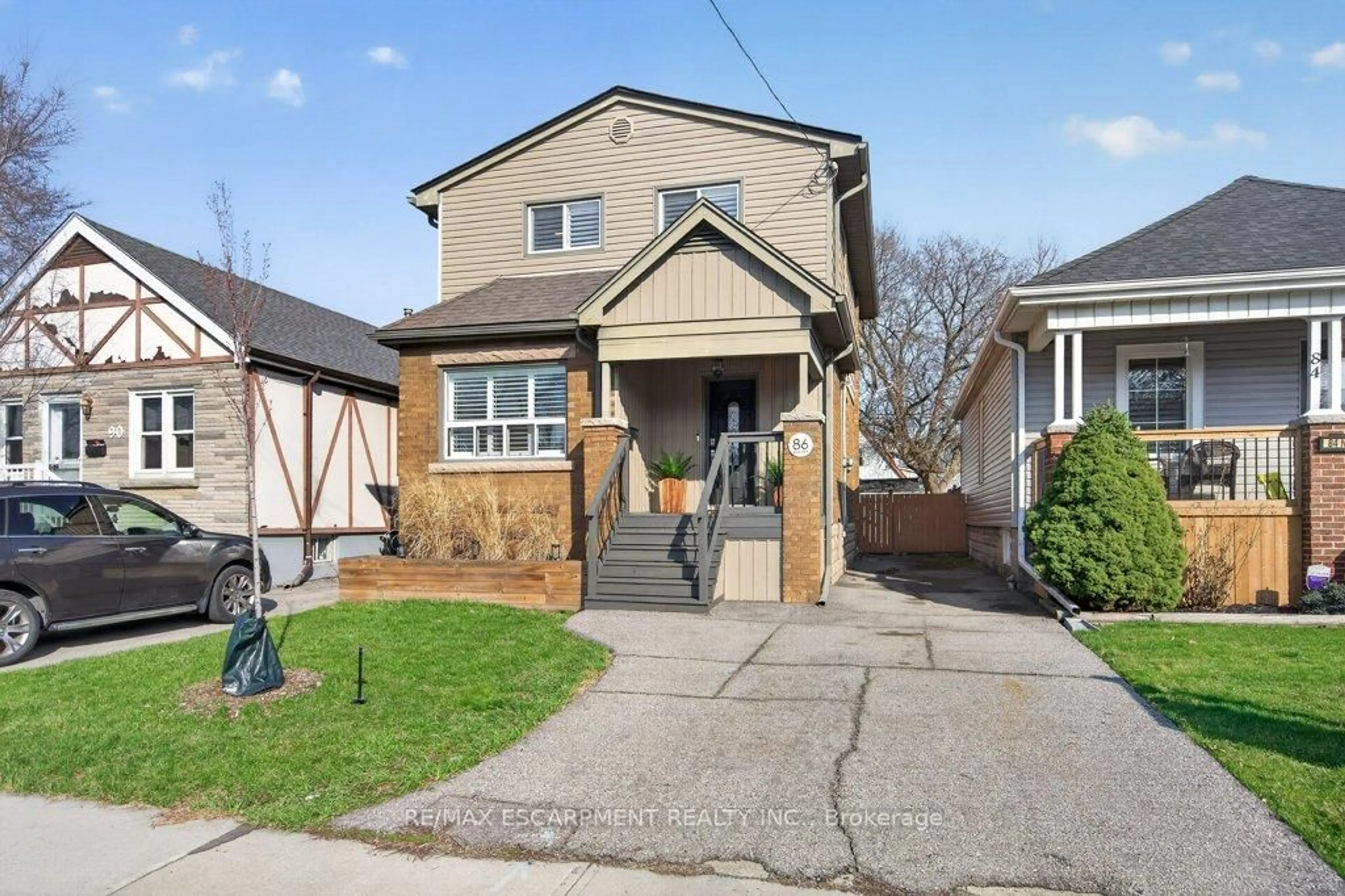 Home with brick exterior material, street for 86 Barons Ave, Hamilton Ontario L8H 5A4