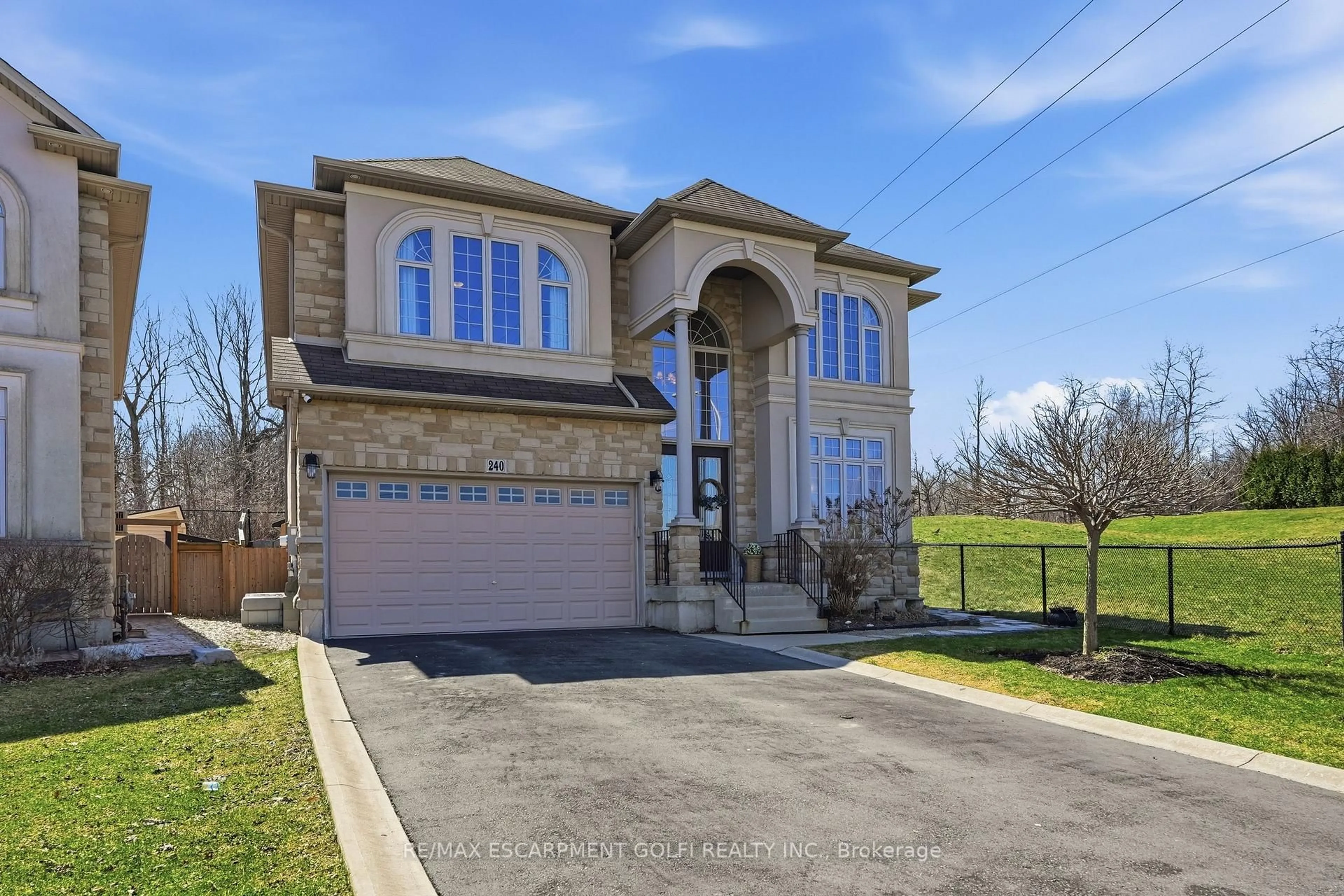 Home with brick exterior material, street for 240 Cloverleaf Dr, Hamilton Ontario L9K 1T2