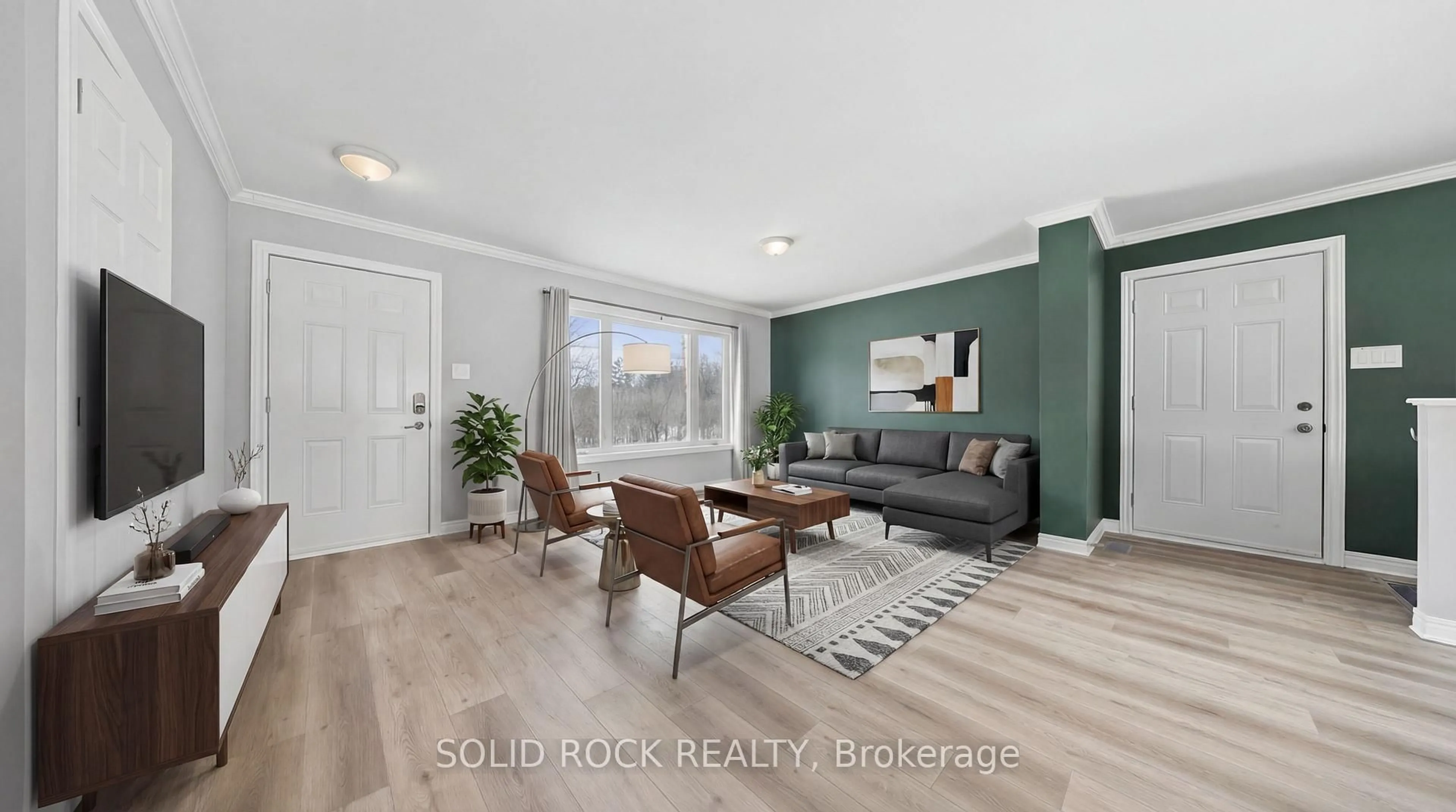 Living room with furniture, wood/laminate floor for 125 Norma St, Arnprior Ontario K7S 3A9