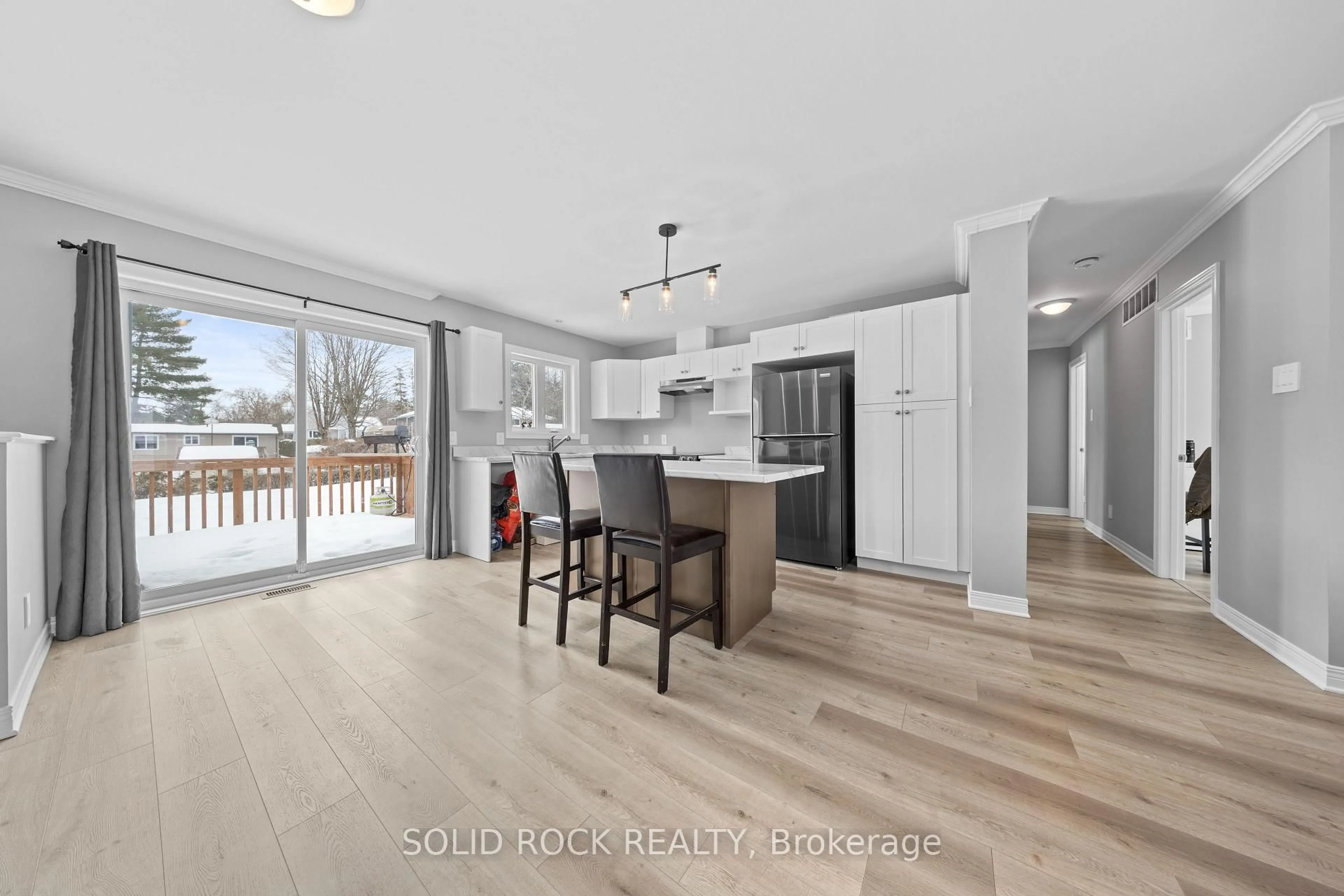 Open concept kitchen, wood/laminate floor for 125 Norma St, Arnprior Ontario K7S 3A9