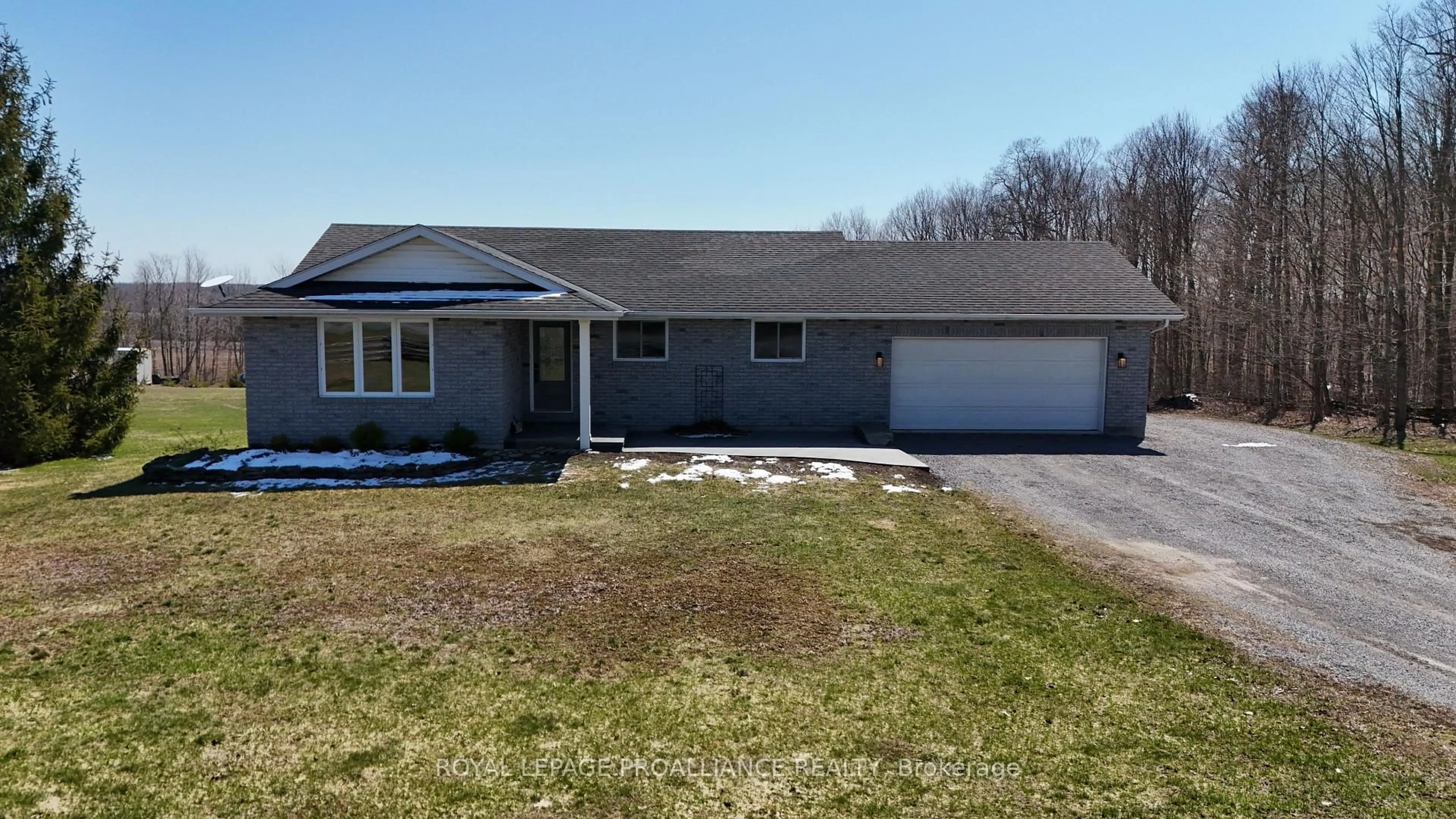 Home with vinyl exterior material, street for 1439 County Road 19, Prince Edward County Ontario K0K 1T0