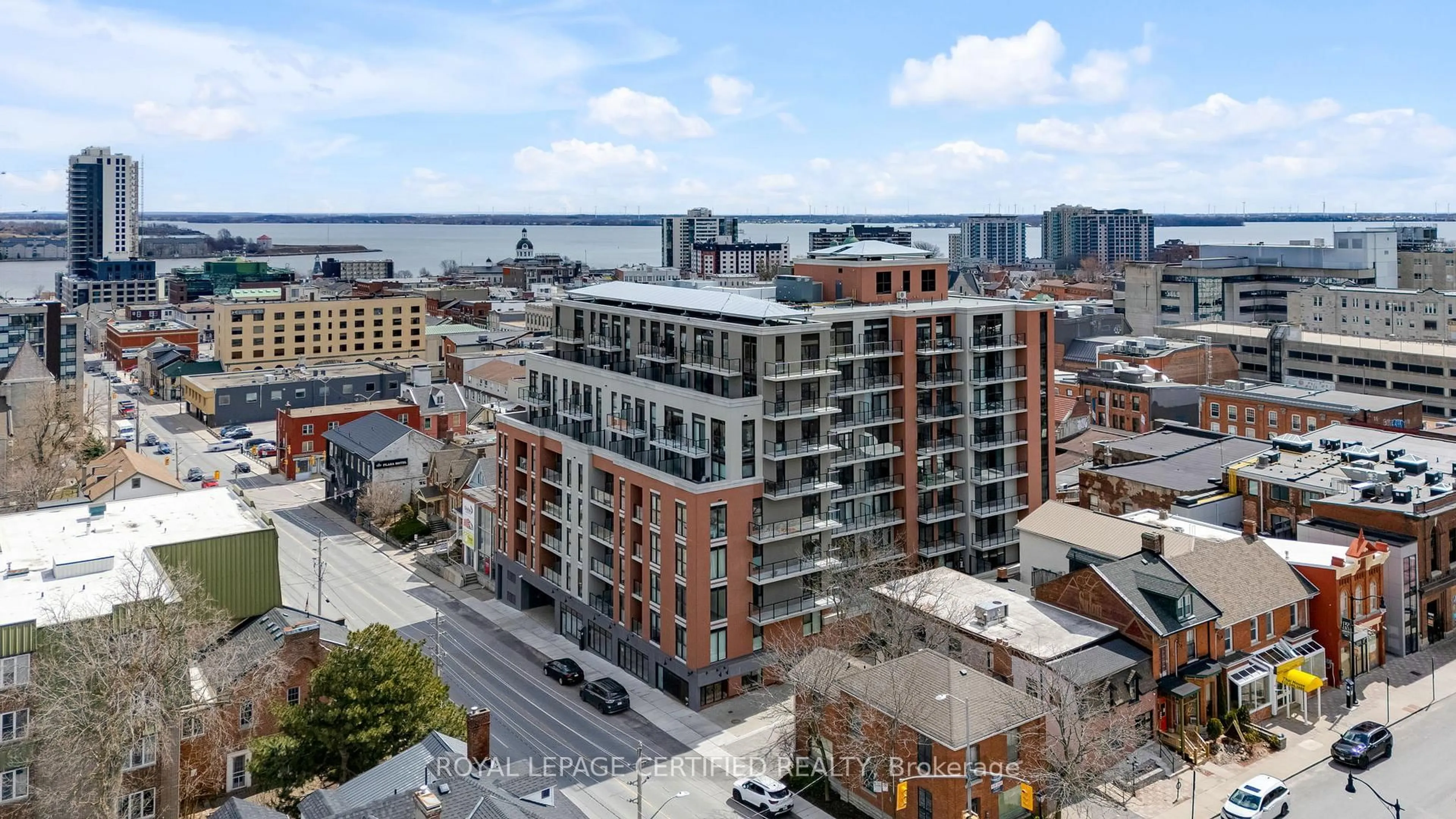 A pic from outside/outdoor area/front of a property/back of a property/a pic from drone, city buildings view from balcony for 223 Princess St #714, Kingston Ontario K7L 1B3