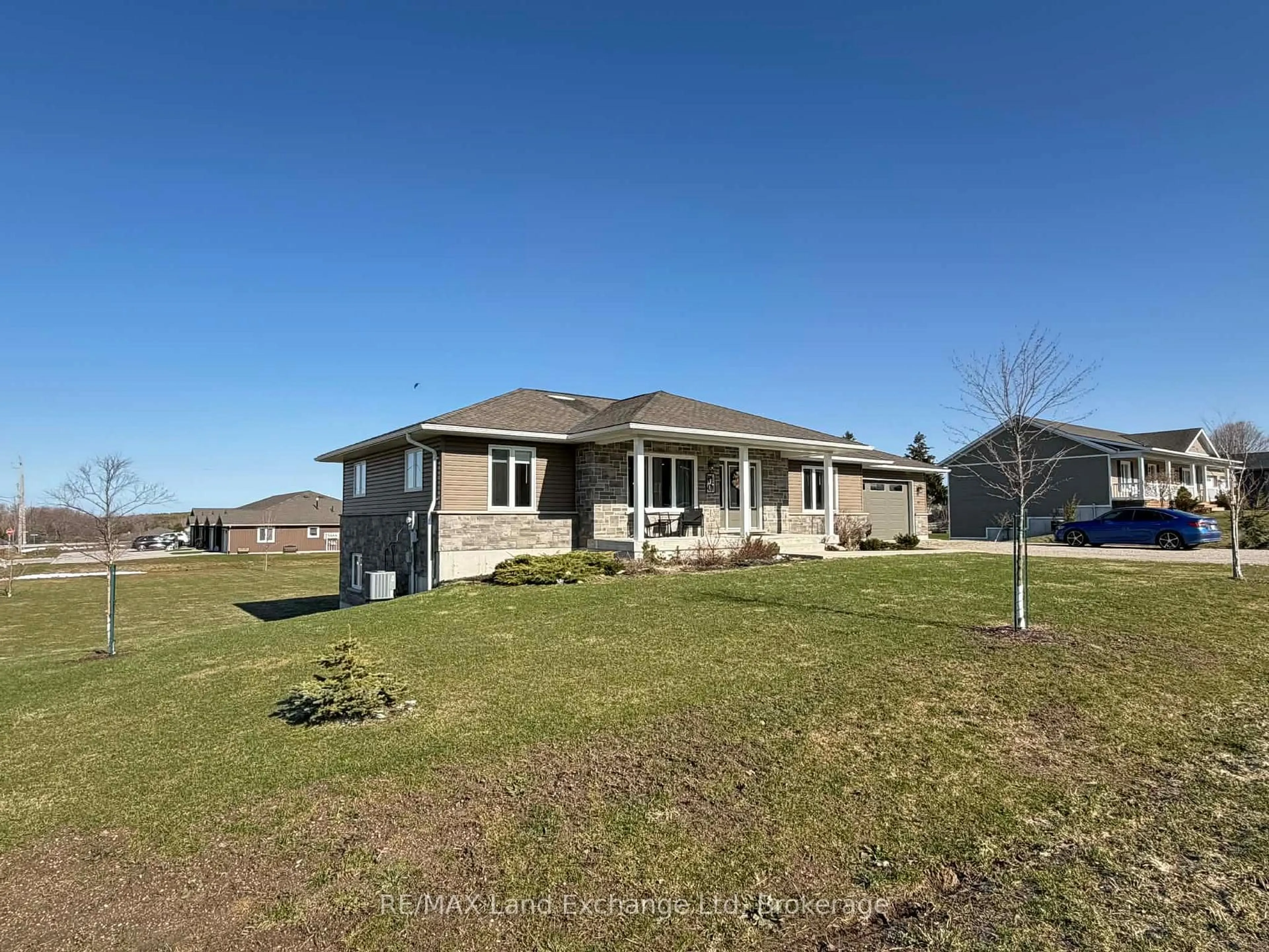 A pic from outside/outdoor area/front of a property/back of a property/a pic from drone, unknown for 42 John St, Morris Turnberry Ontario N0G 1E0