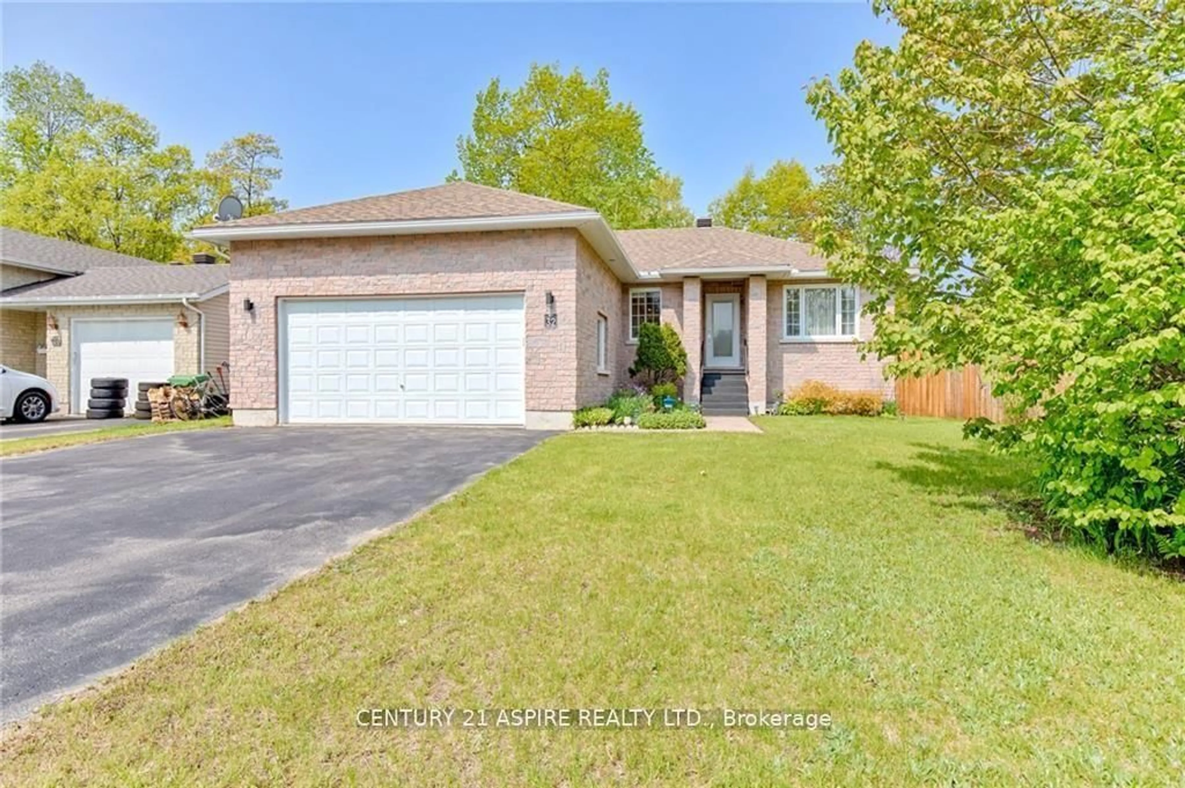 Home with brick exterior material, street for 32 Bayshore Dr, Petawawa Ontario K8H 3R7