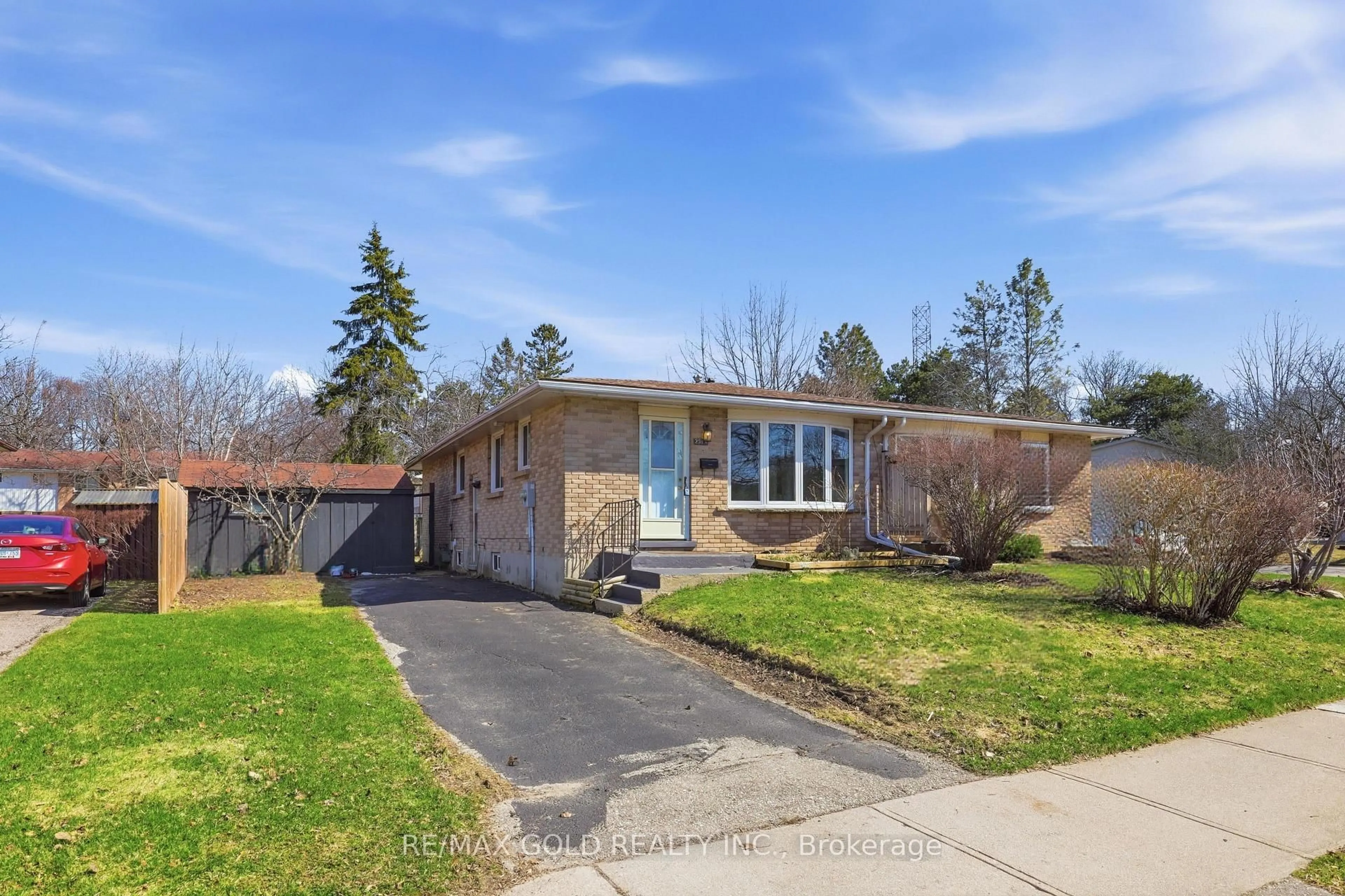 Home with brick exterior material, street for 231A Cedarbrae Ave, Waterloo Ontario N2L 4S6