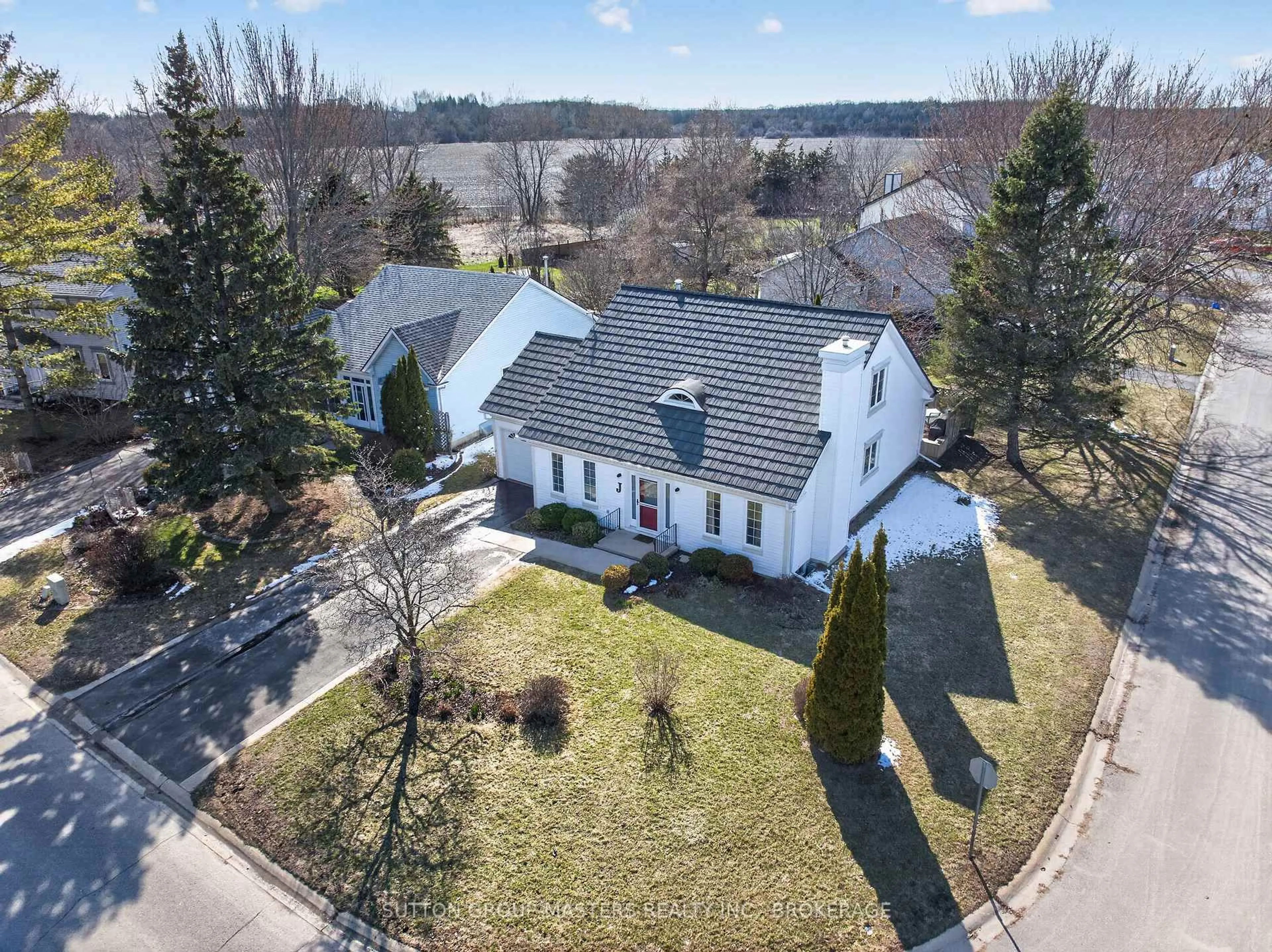 A pic from outside/outdoor area/front of a property/back of a property/a pic from drone, street for 16 Country Club Dr, Bath Ontario K0H 1G0