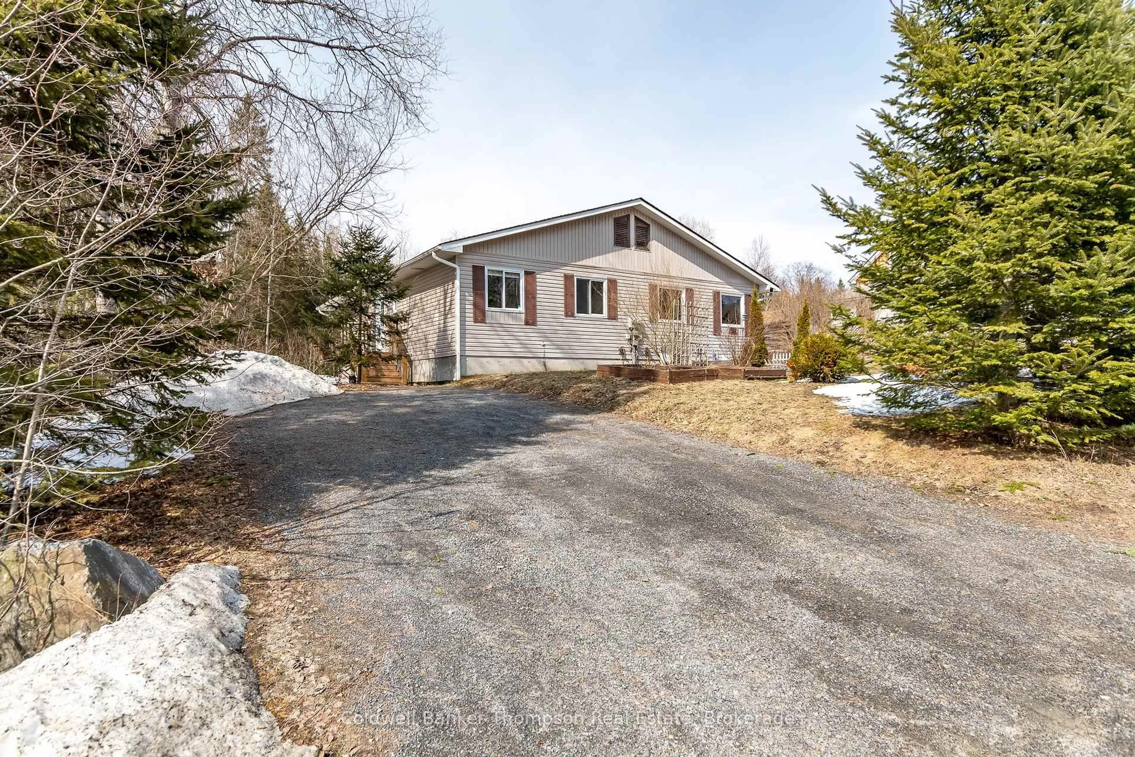 A pic from outside/outdoor area/front of a property/back of a property/a pic from drone, street for 134 Chaffey Township Rd, Huntsville Ontario P1H 1C8
