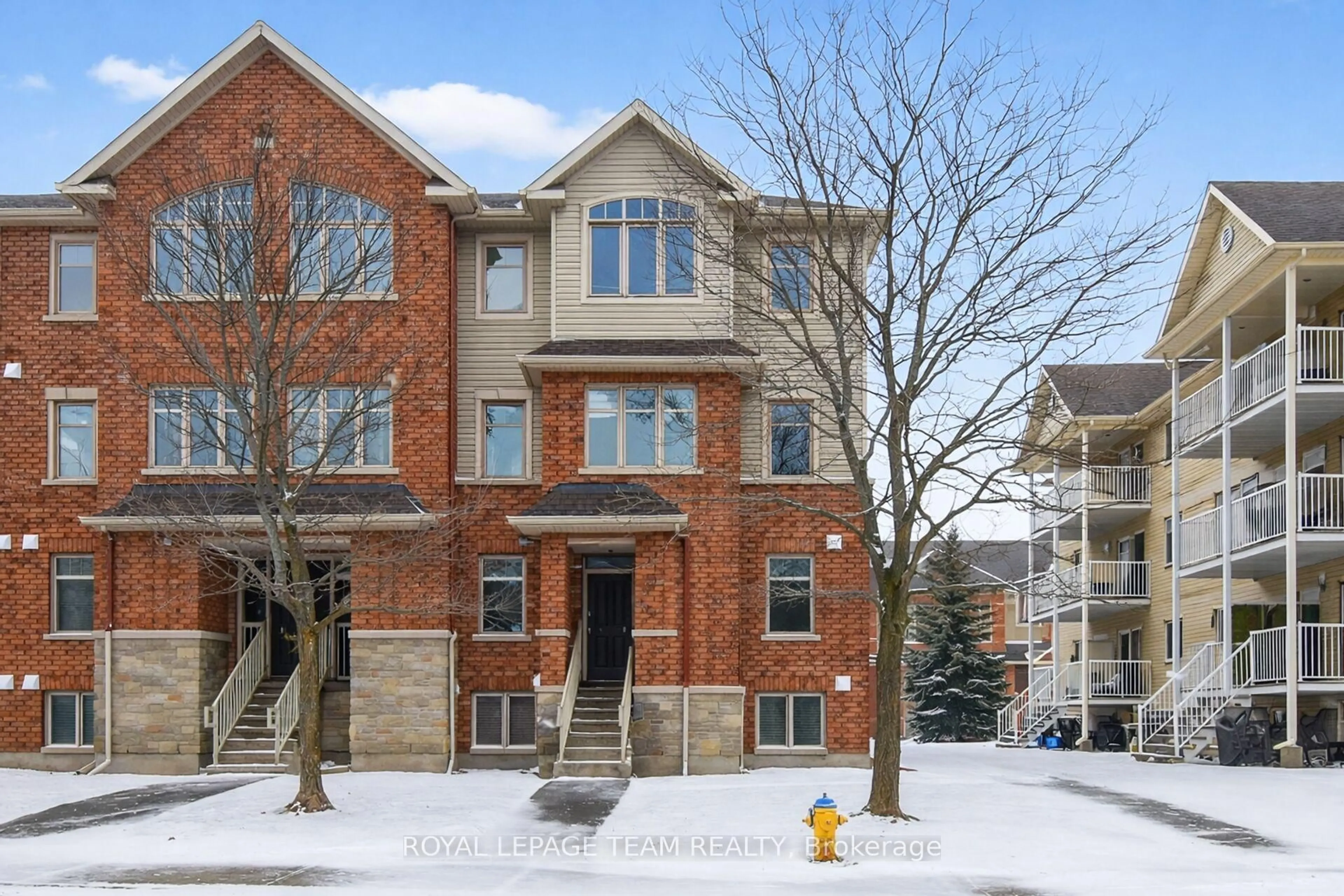 Home with brick exterior material, street for 255 Deercroft Ave, Ottawa Ontario K2J 5J9