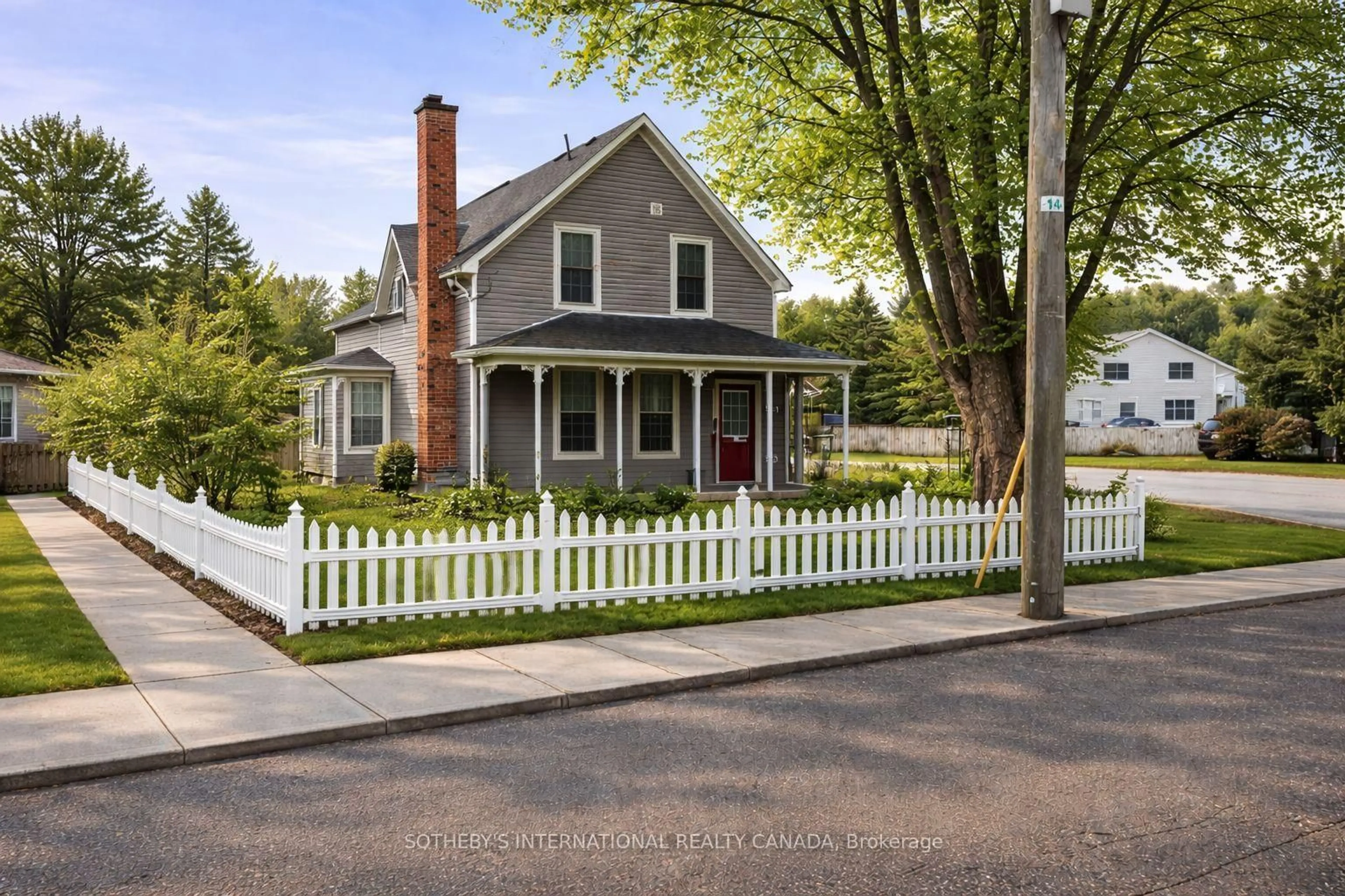 Home with vinyl exterior material, street for 35 Lake St, Prince Edward County Ontario K0K 2T0