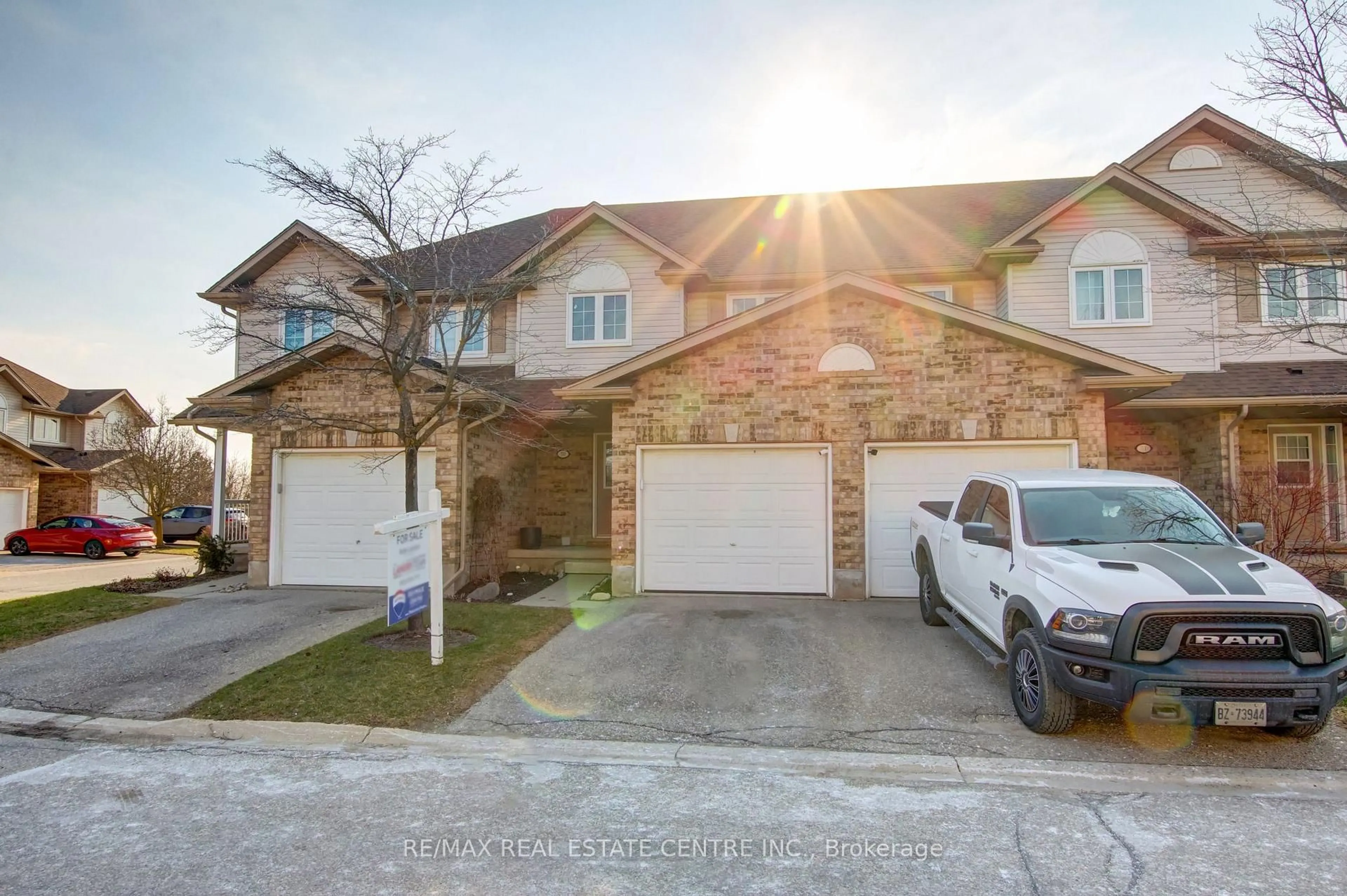 A pic from outside/outdoor area/front of a property/back of a property/a pic from drone, street for 31 Schroder Cres #50, Guelph Ontario N1E 7M6