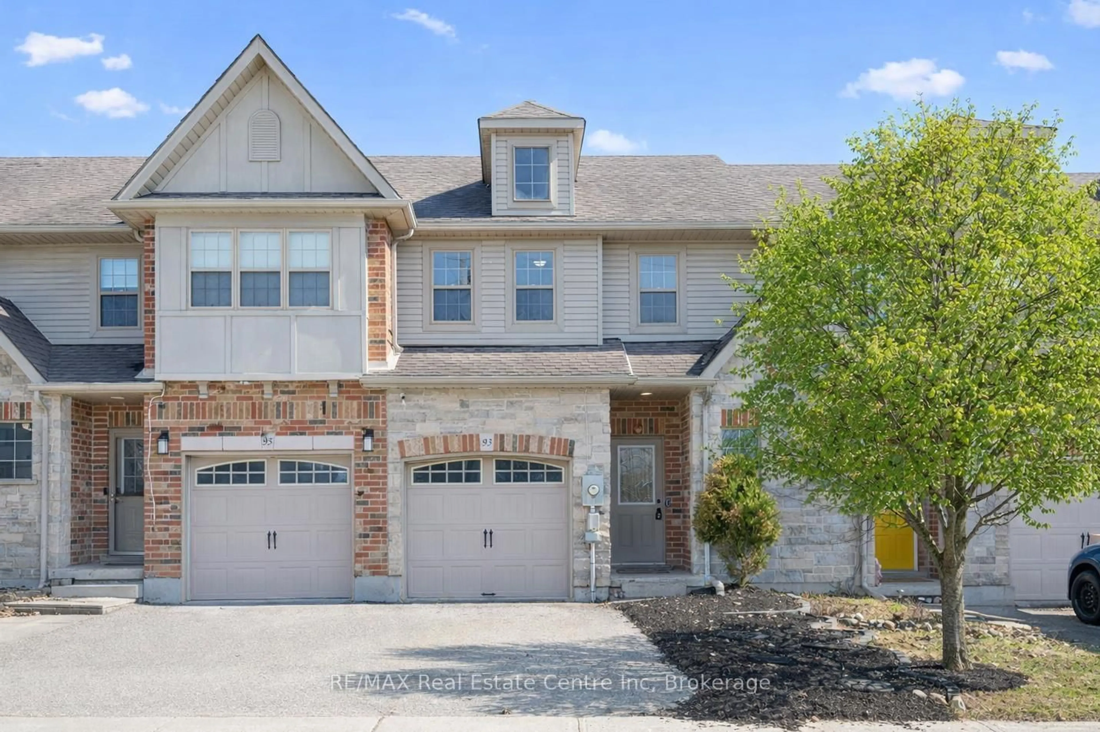 Home with brick exterior material, street for 93 WASHBURN Dr, Guelph Ontario N1E 0B3