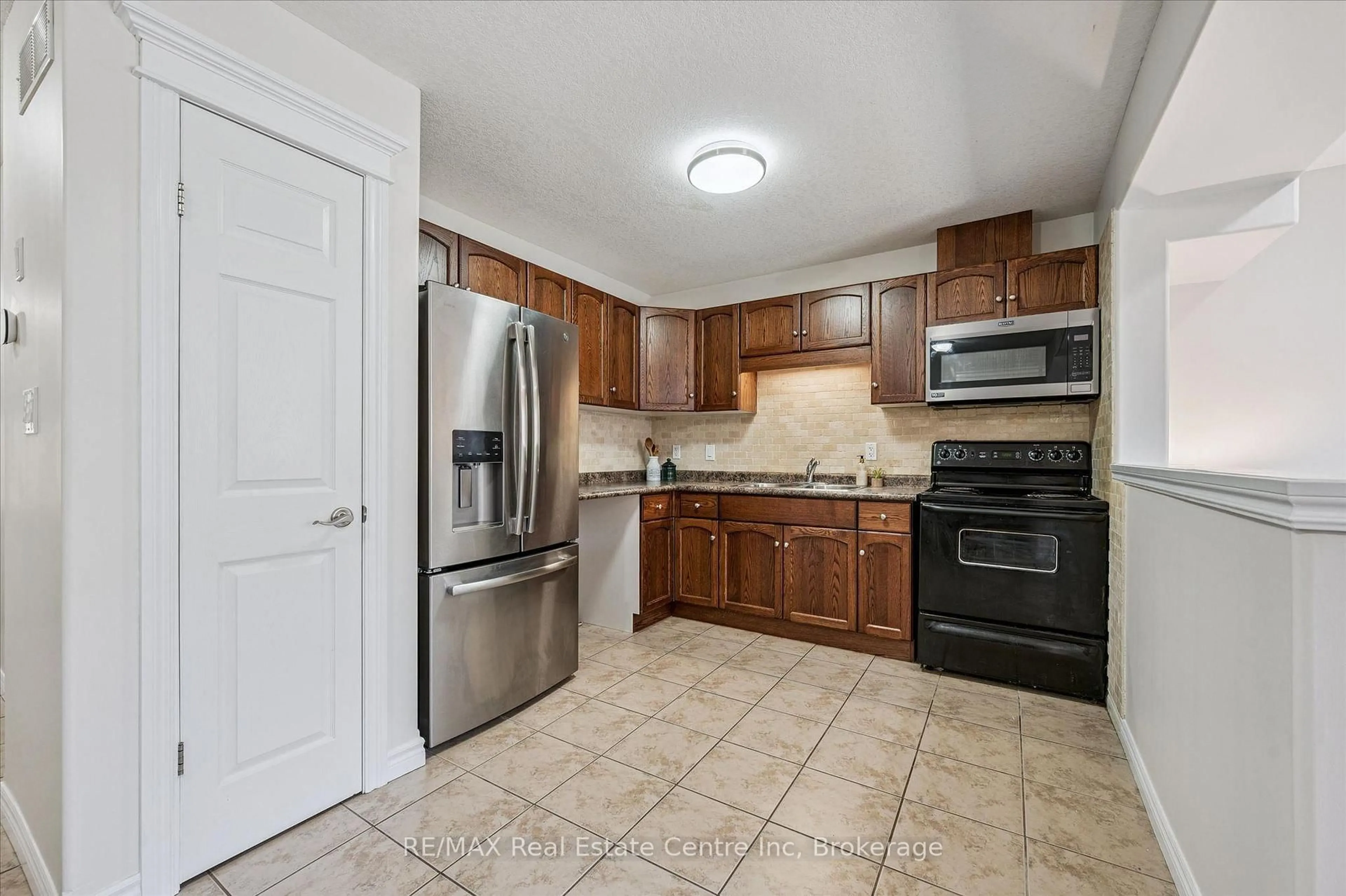 Standard kitchen, ceramic/tile floor for 93 WASHBURN Dr, Guelph Ontario N1E 0B3