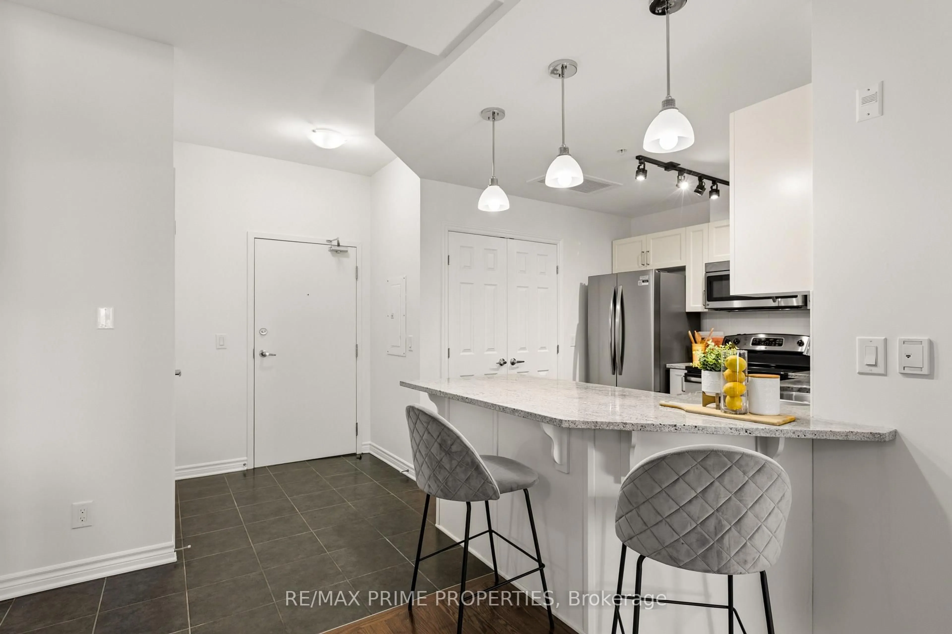 Open concept kitchen, ceramic/tile floor for 1201 OHIO St #202, Ottawa Ontario K1H 0A1