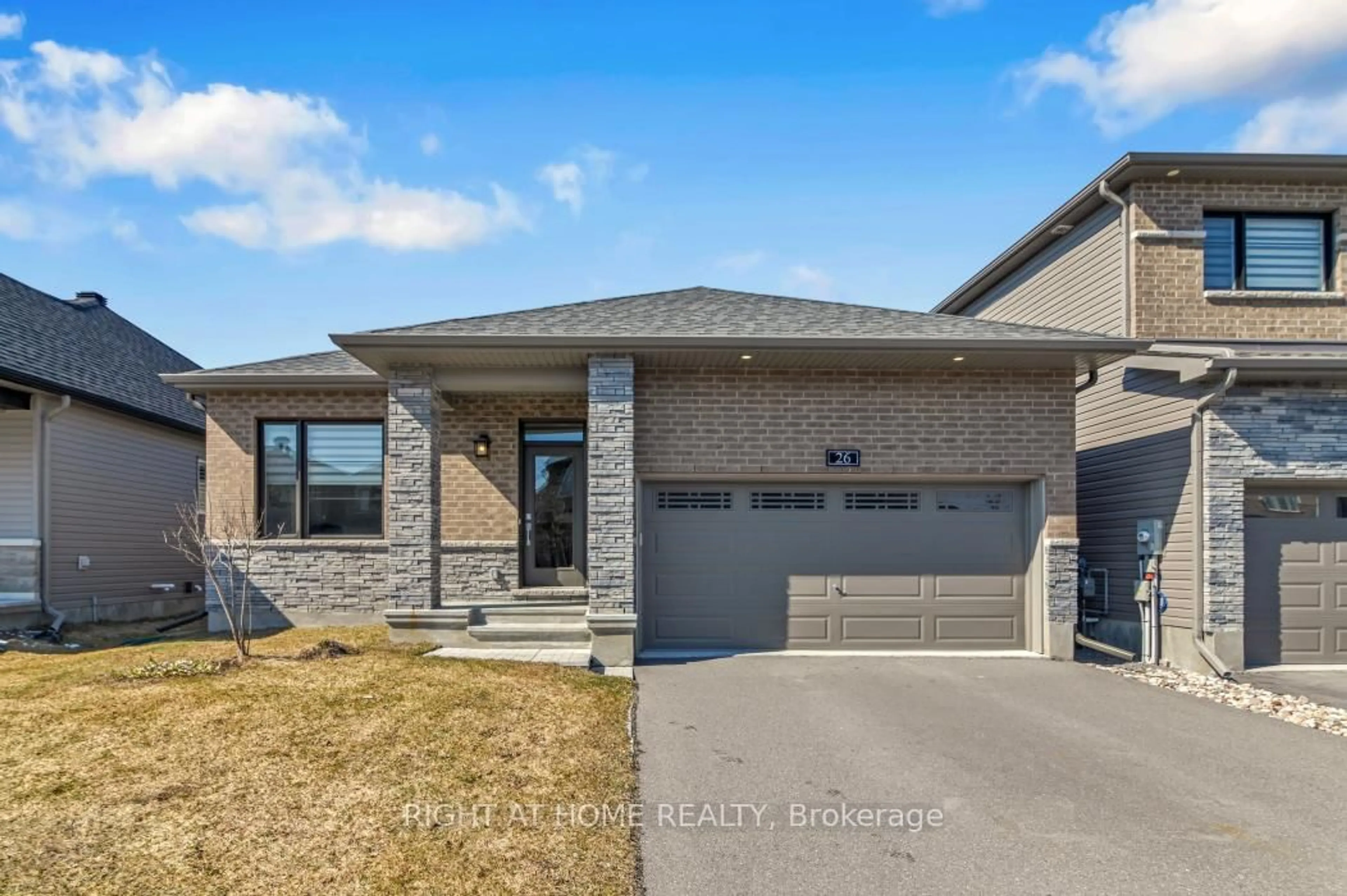 Home with brick exterior material, street for 26 Stickleback Way, Ottawa Ontario K4A 1K9