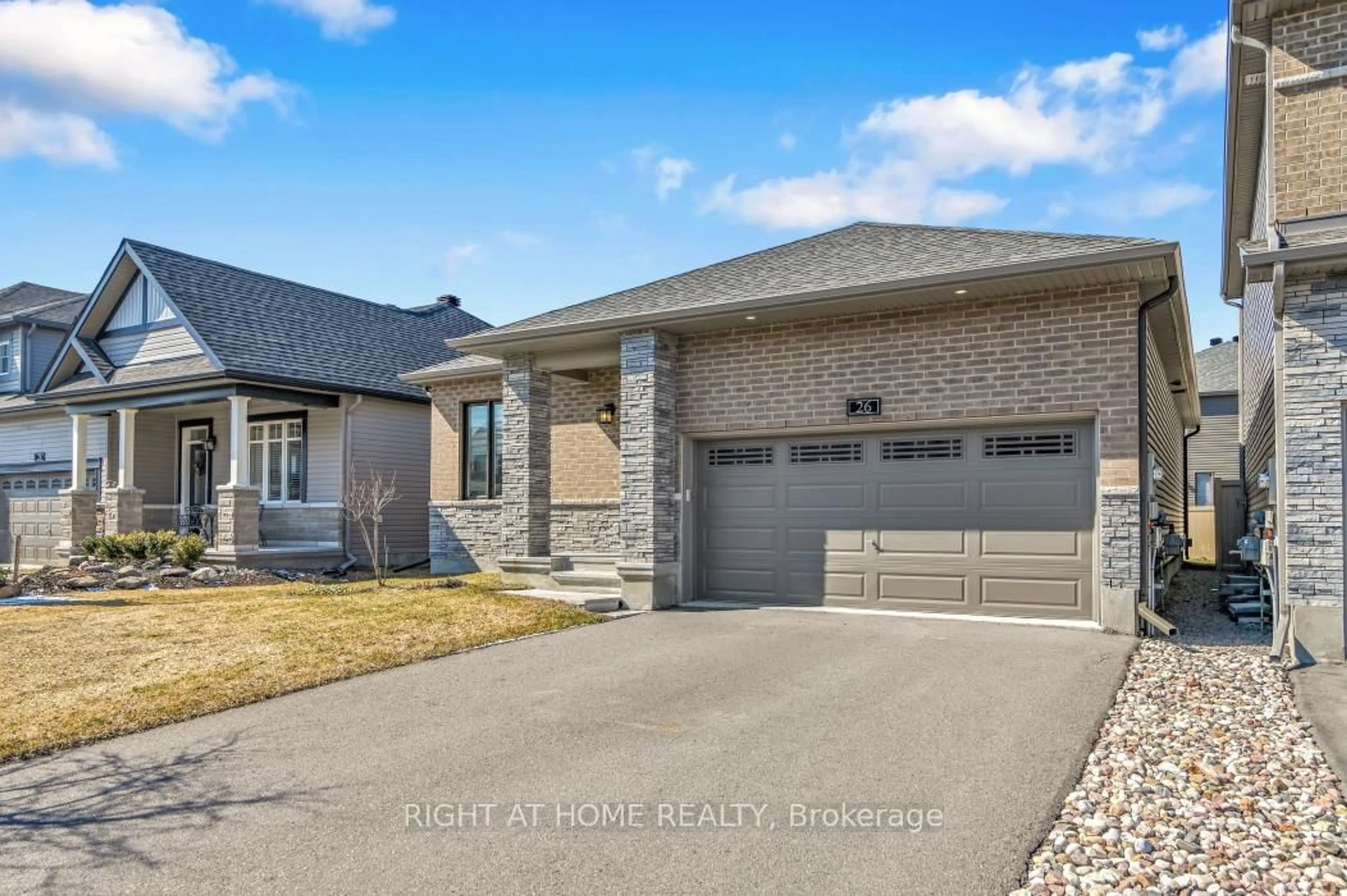 Home with brick exterior material, street for 26 Stickleback Way, Ottawa Ontario K4A 1K9