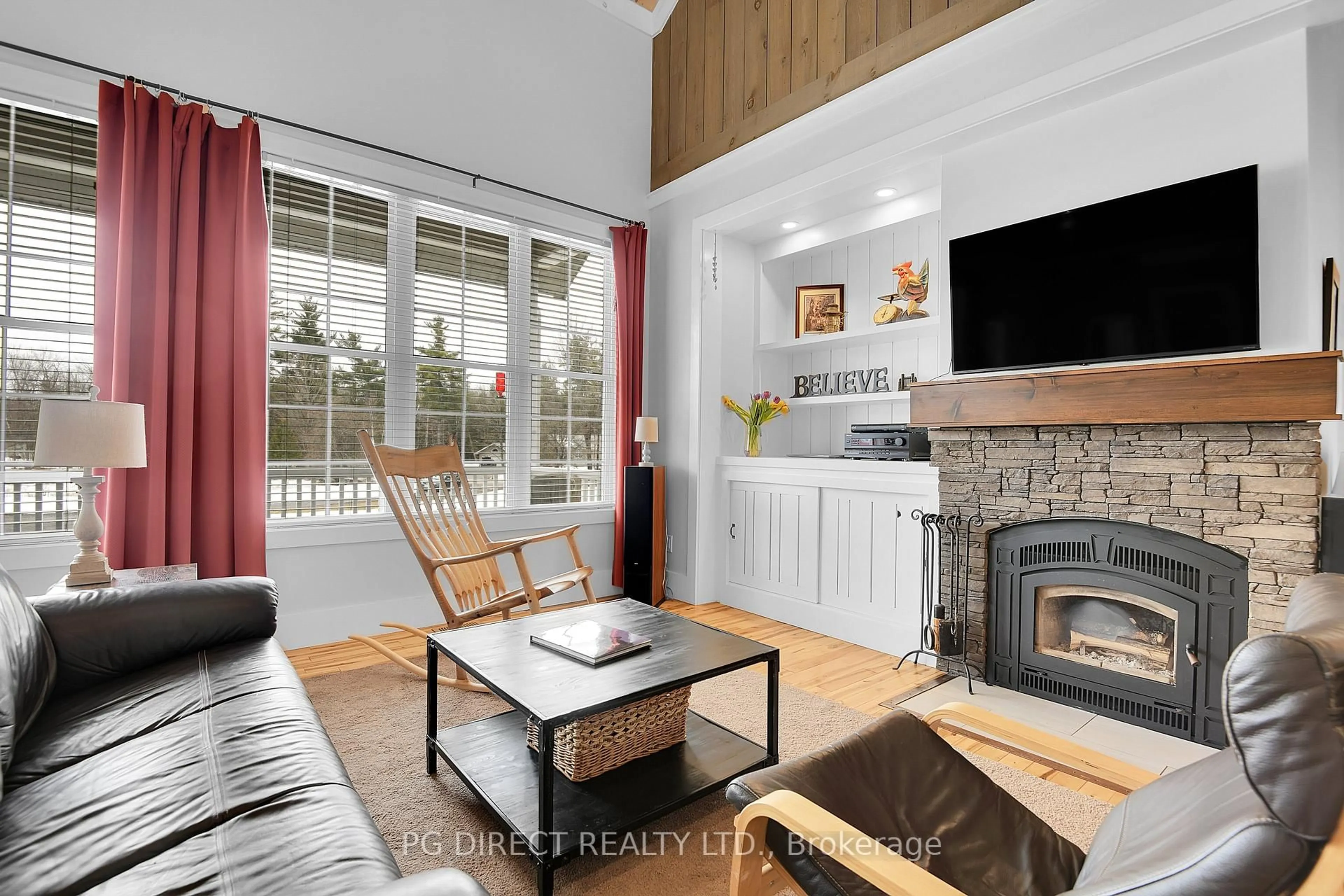 Living room with furniture, wood/laminate floor for 366 Bellamy Rd, White Lake Ontario K0A 3L0
