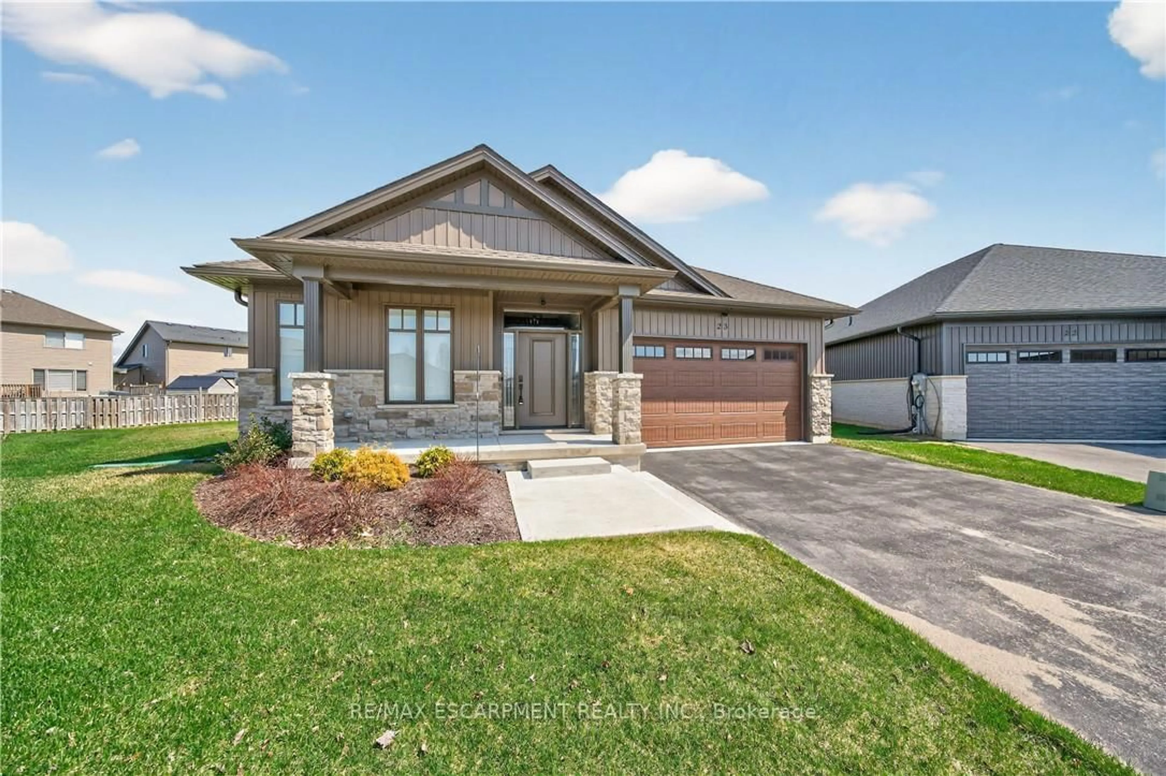 Home with brick exterior material, street for 24 Craddock Blvd #23, Haldimand Ontario N0A 1J0