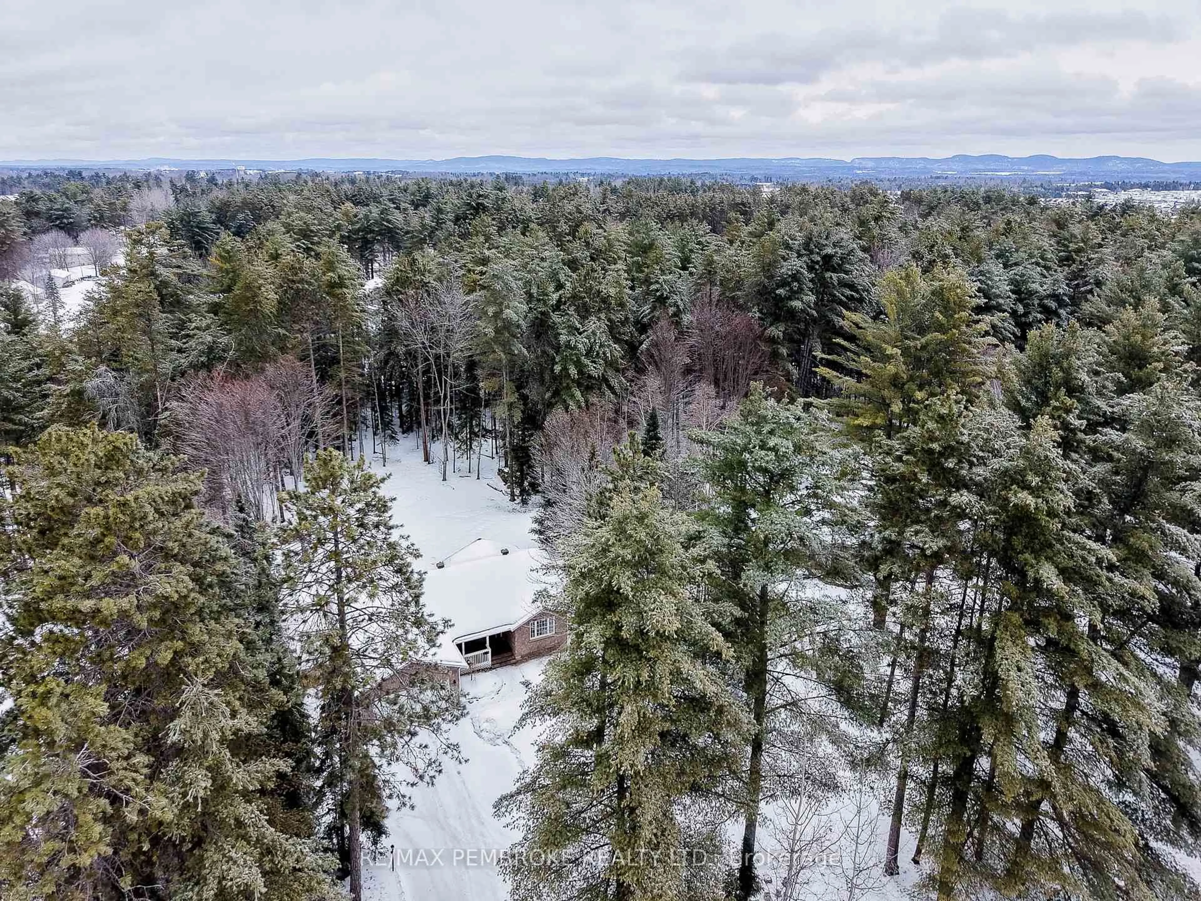 A pic from outside/outdoor area/front of a property/back of a property/a pic from drone, forest/trees view for 6 Steffen St, Petawawa Ontario K8H 3L8