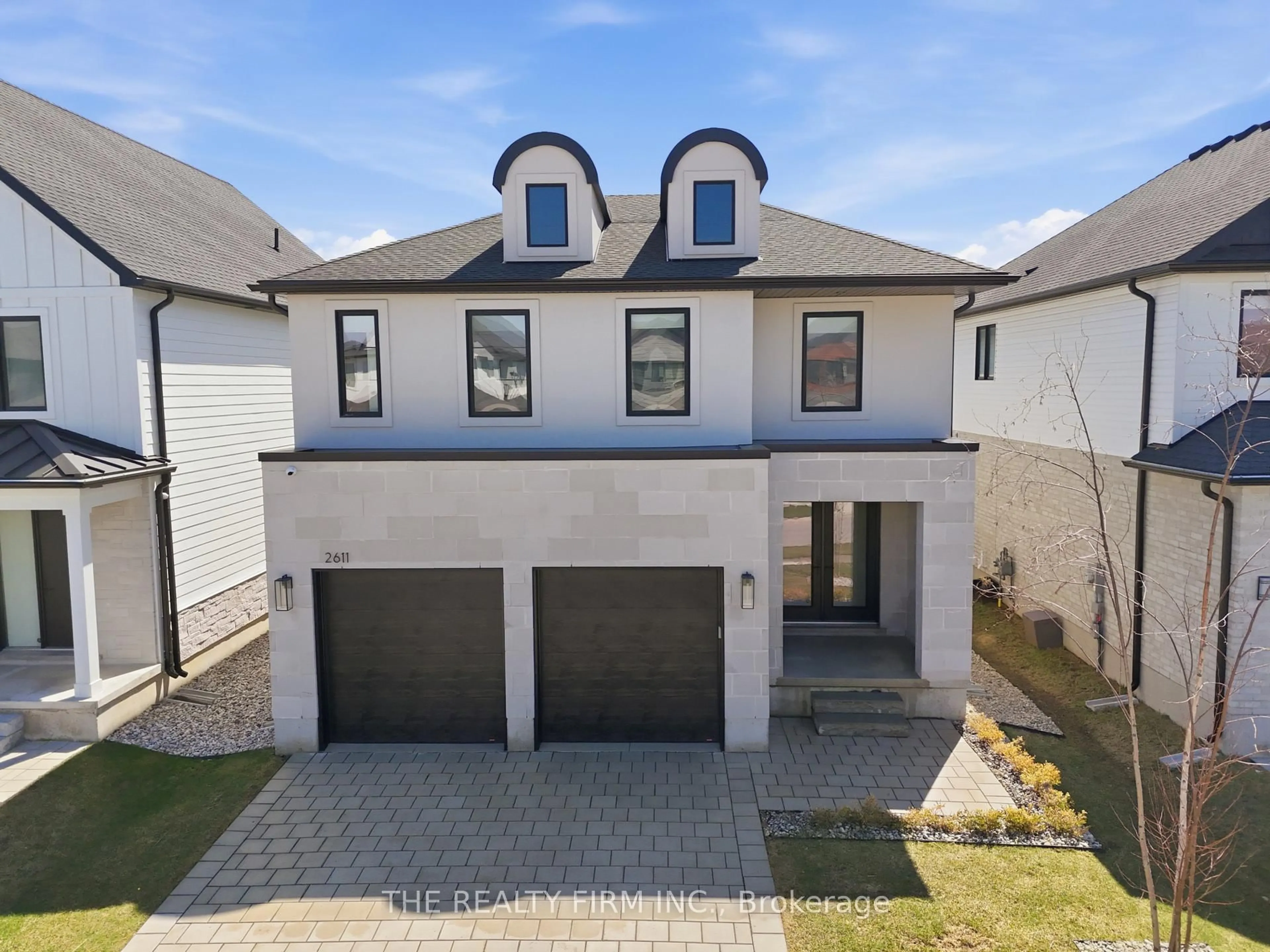 A pic from outside/outdoor area/front of a property/back of a property/a pic from drone, street for 2611 Buroak Dr, London North Ontario N6G 3W1