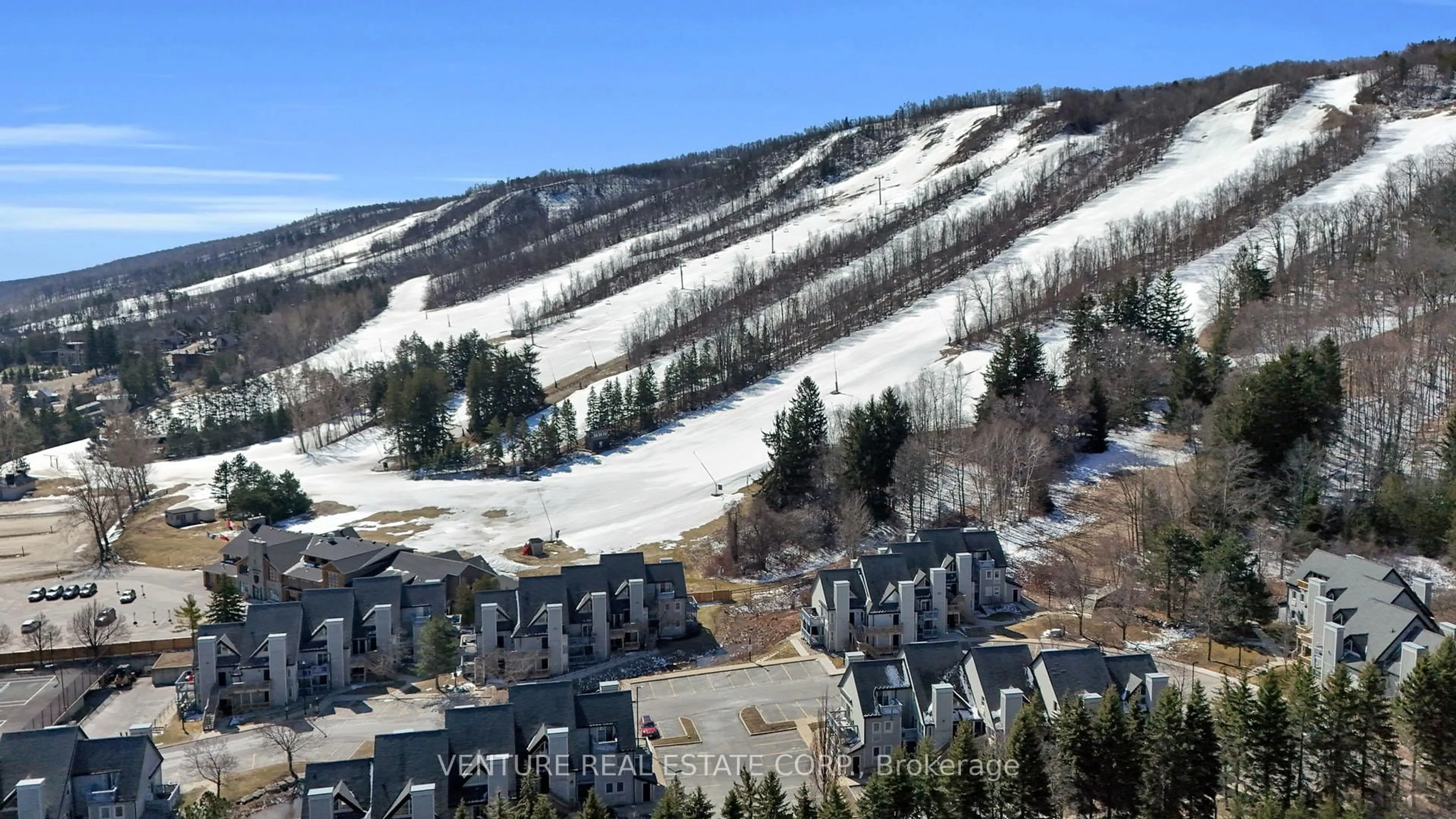 A pic from outside/outdoor area/front of a property/back of a property/a pic from drone, mountain view for 796468 Grey Road 19 Rd #707, Blue Mountains Ontario L9Y 0N6