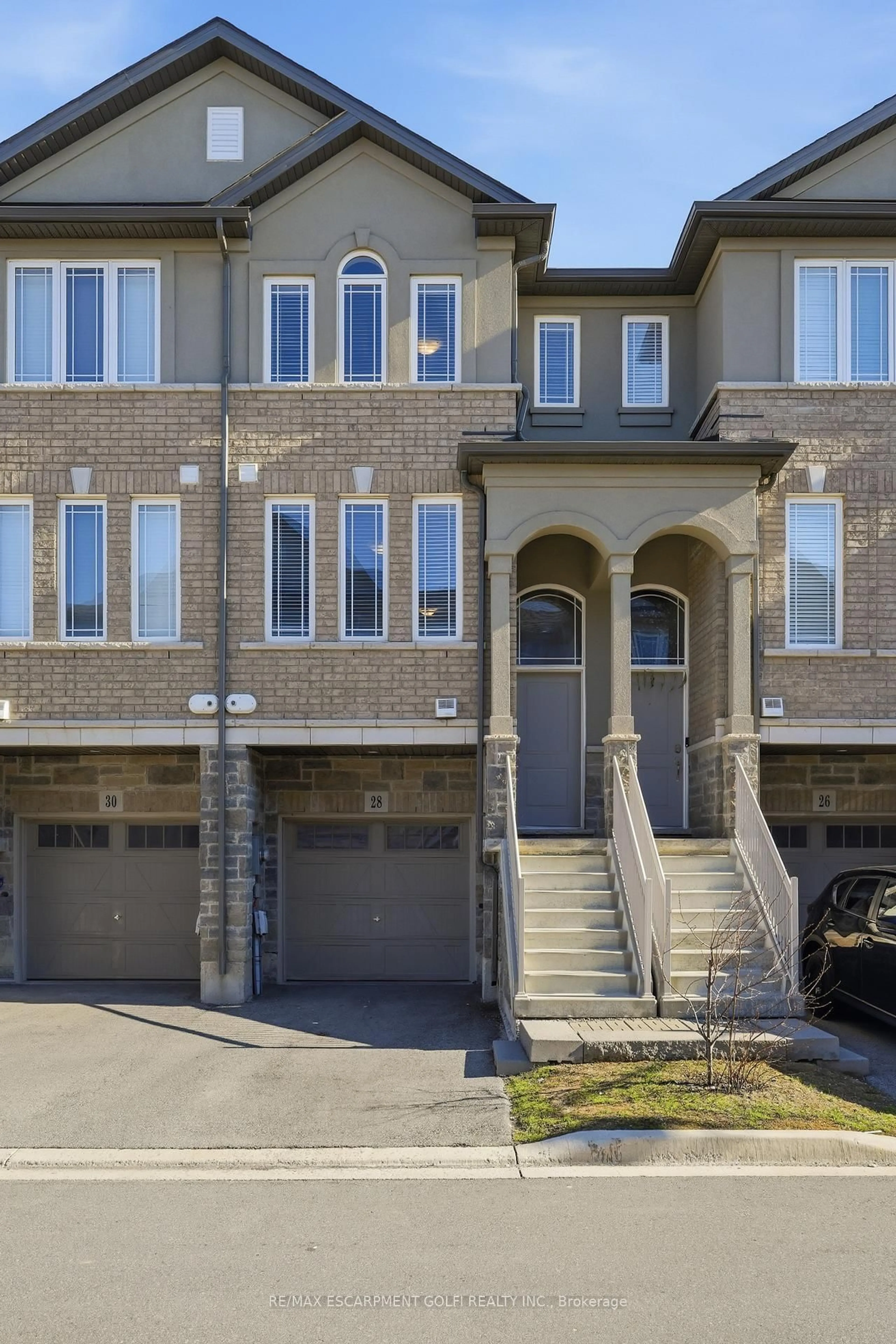Home with brick exterior material, street for 28 Aqua Lane, Hamilton Ontario L0R 1P0