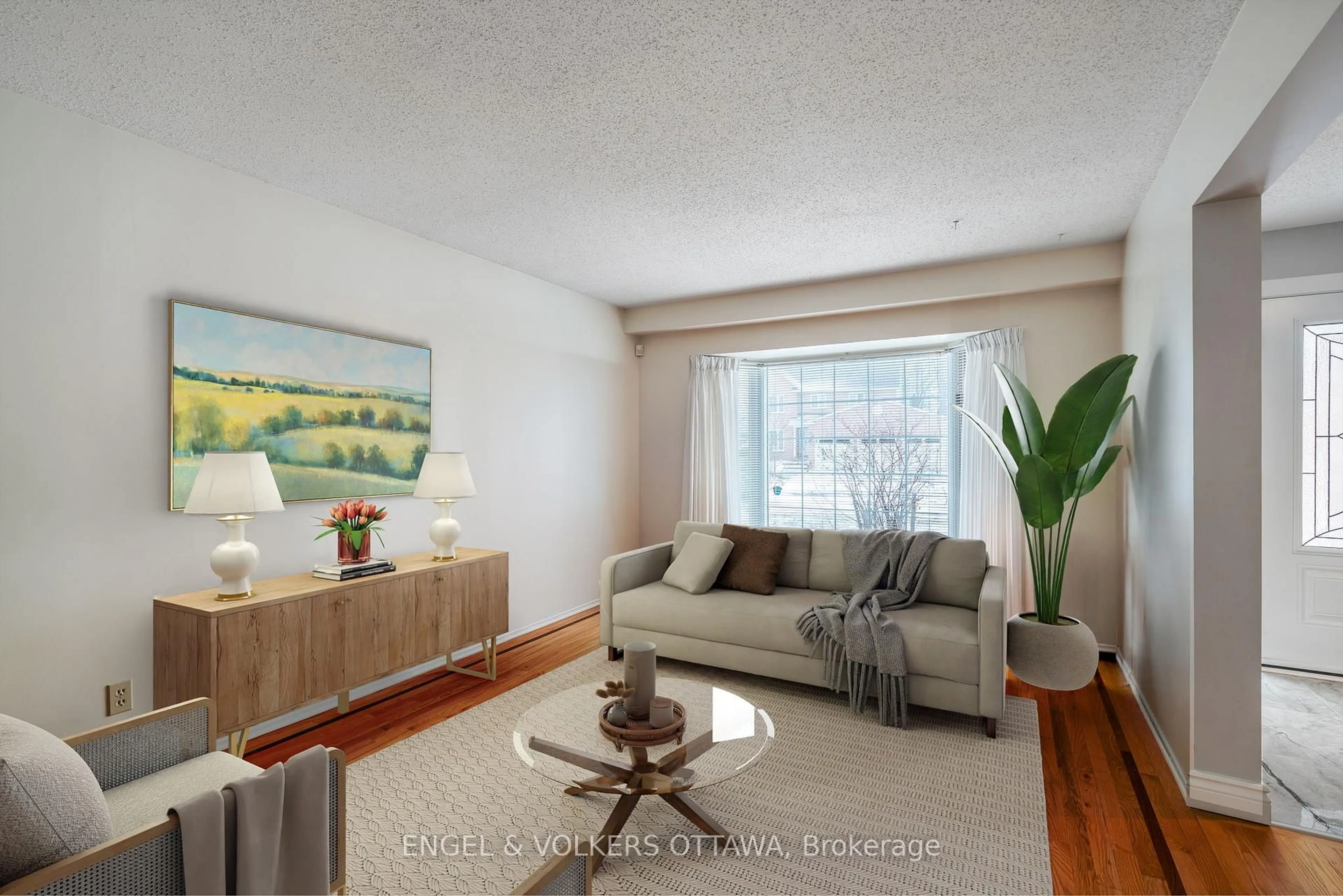 Living room with furniture, wood/laminate floor for 3 Balding Cres, Ottawa Ontario K2K 2L4