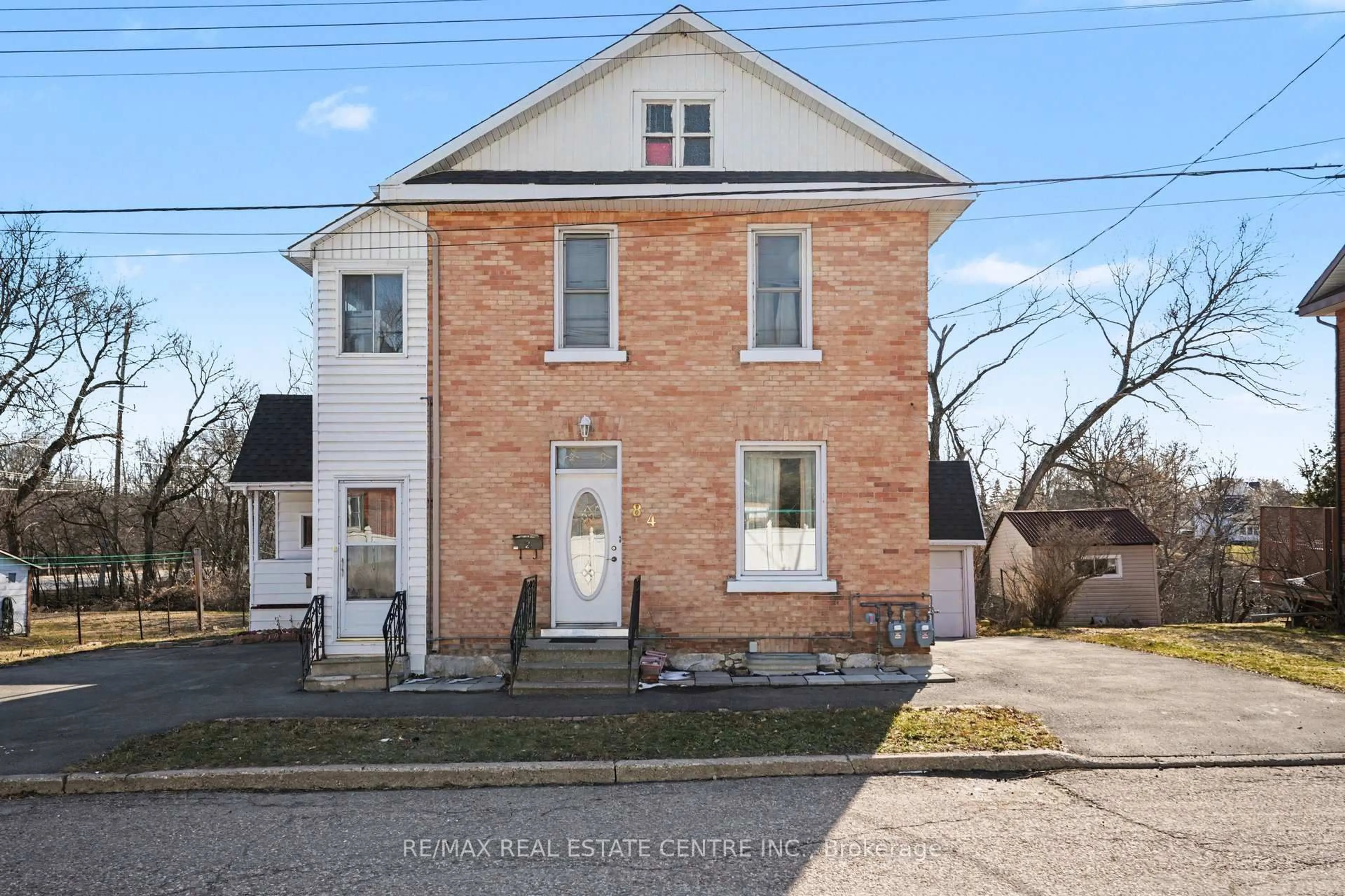 Home with brick exterior material, street for 84 Bank St, Renfrew Ontario K7V 2E2