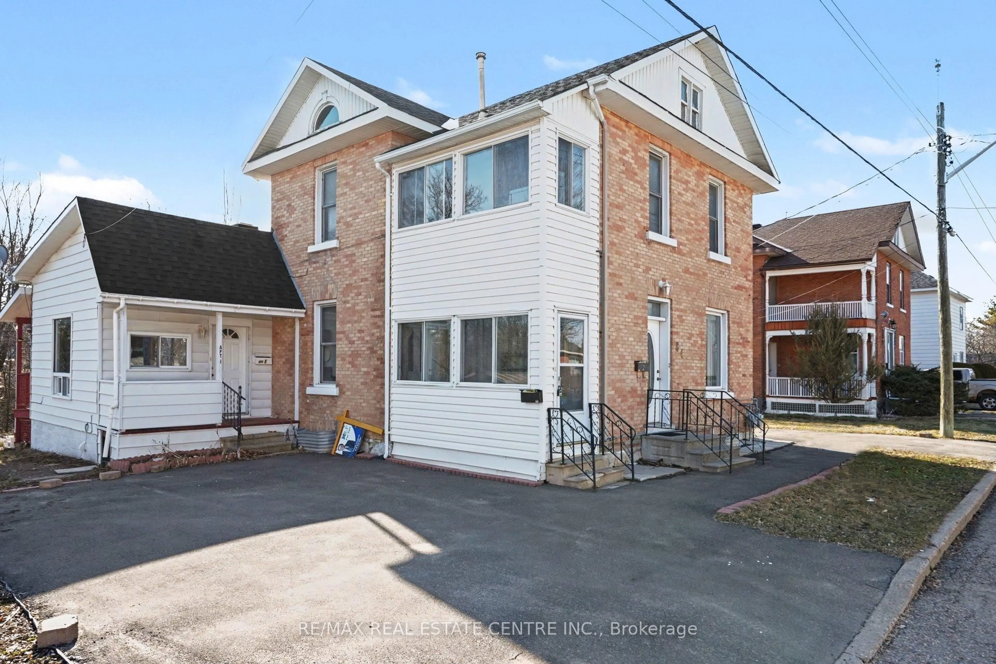 Home with brick exterior material, street for 84 Bank St, Renfrew Ontario K7V 2E2