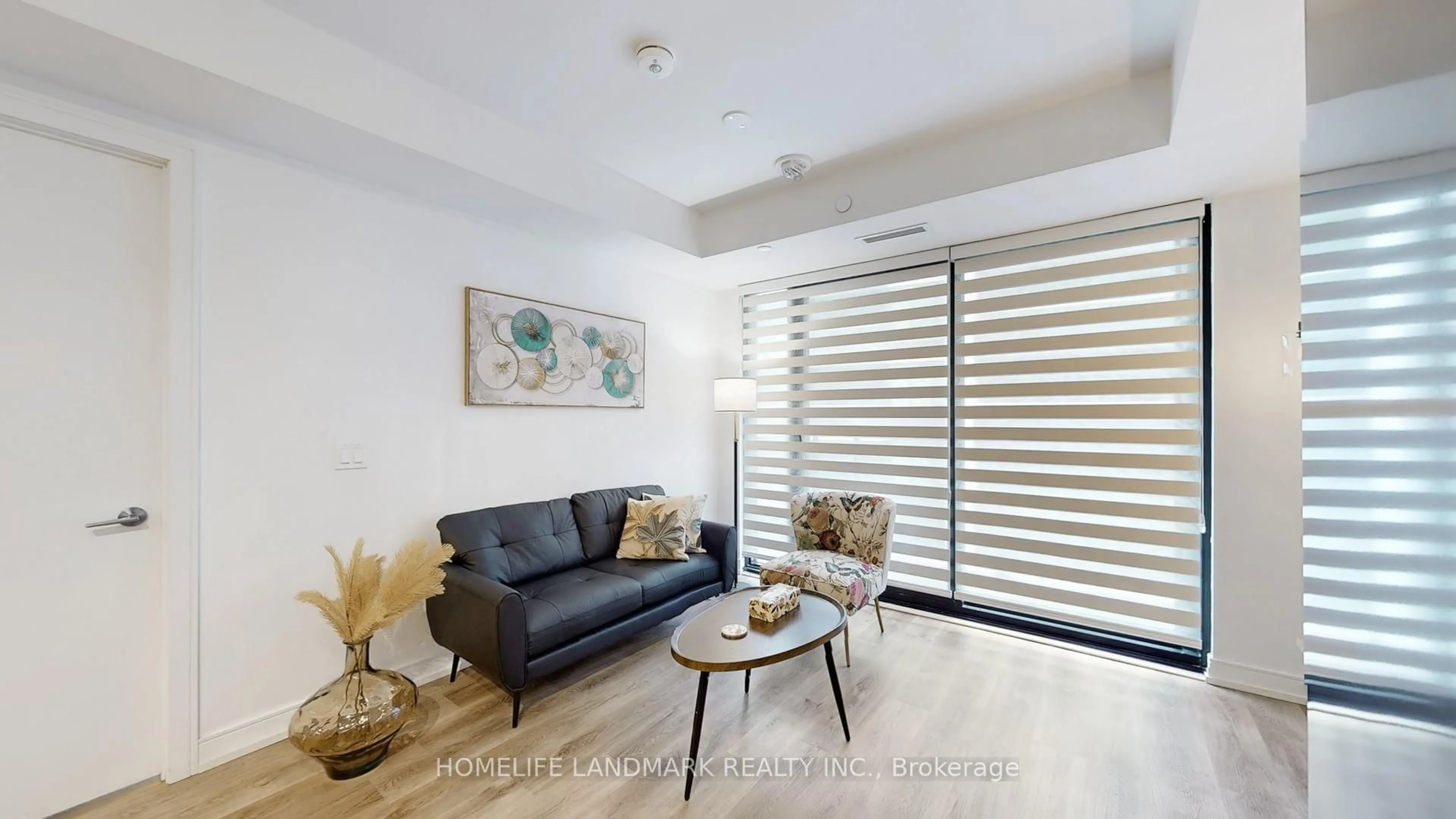 Living room with furniture, wood/laminate floor for 1 Jarvis St, Hamilton Ontario L8R 0A8