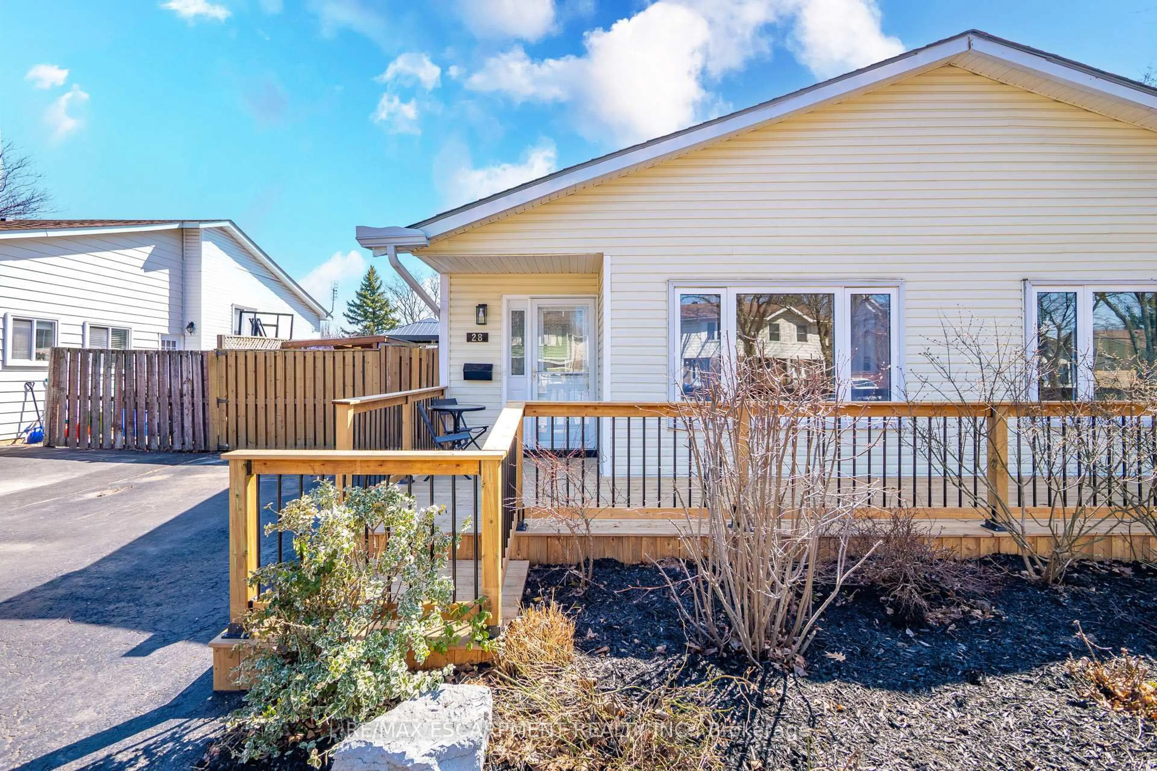 Home with vinyl exterior material, street for 28 Golden Orchard Dr, Hamilton Ontario L9H 4Z8