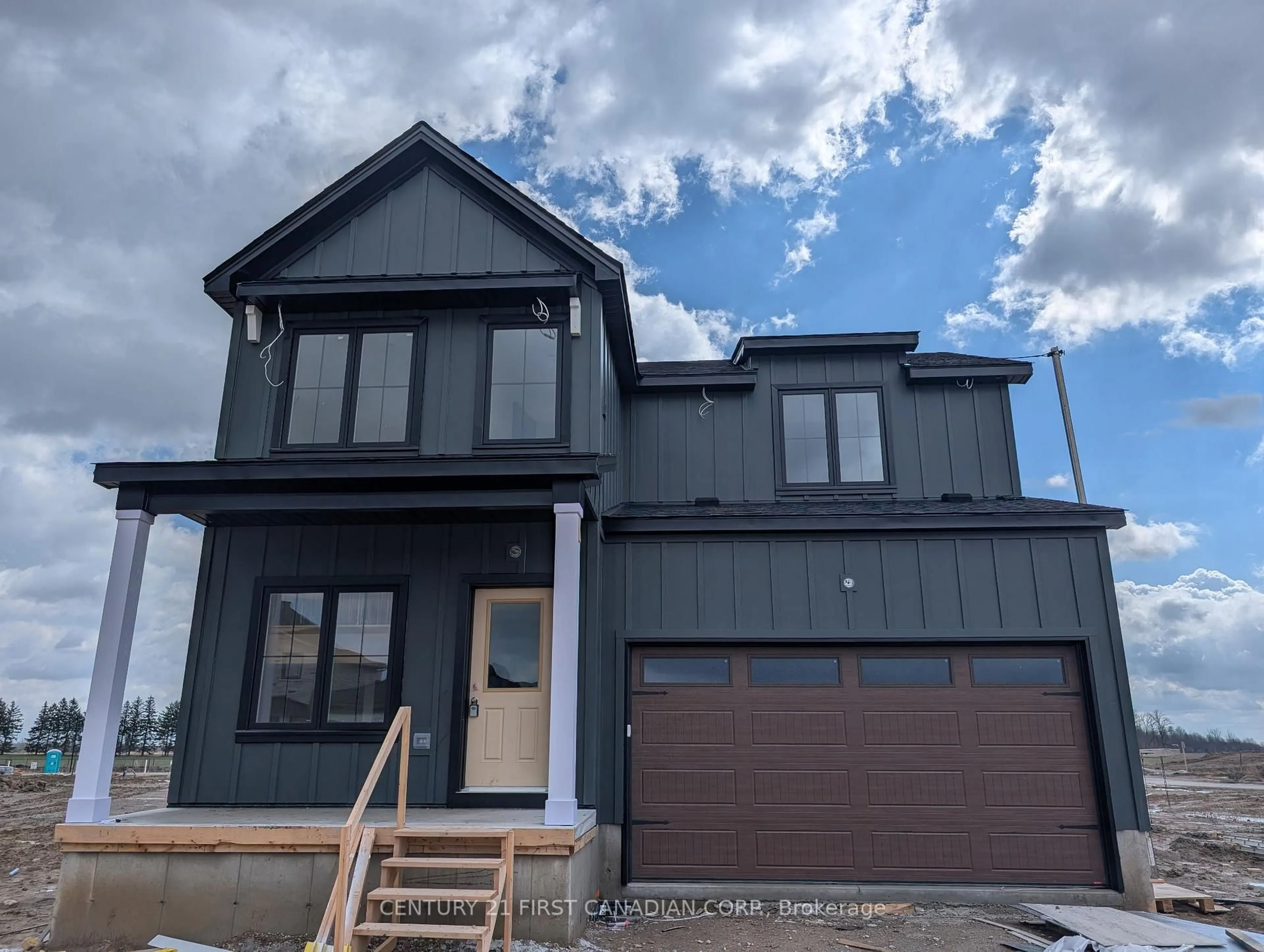 Home with vinyl exterior material, street for 30 Sheldabren St, North Middlesex Ontario N0M 1A0