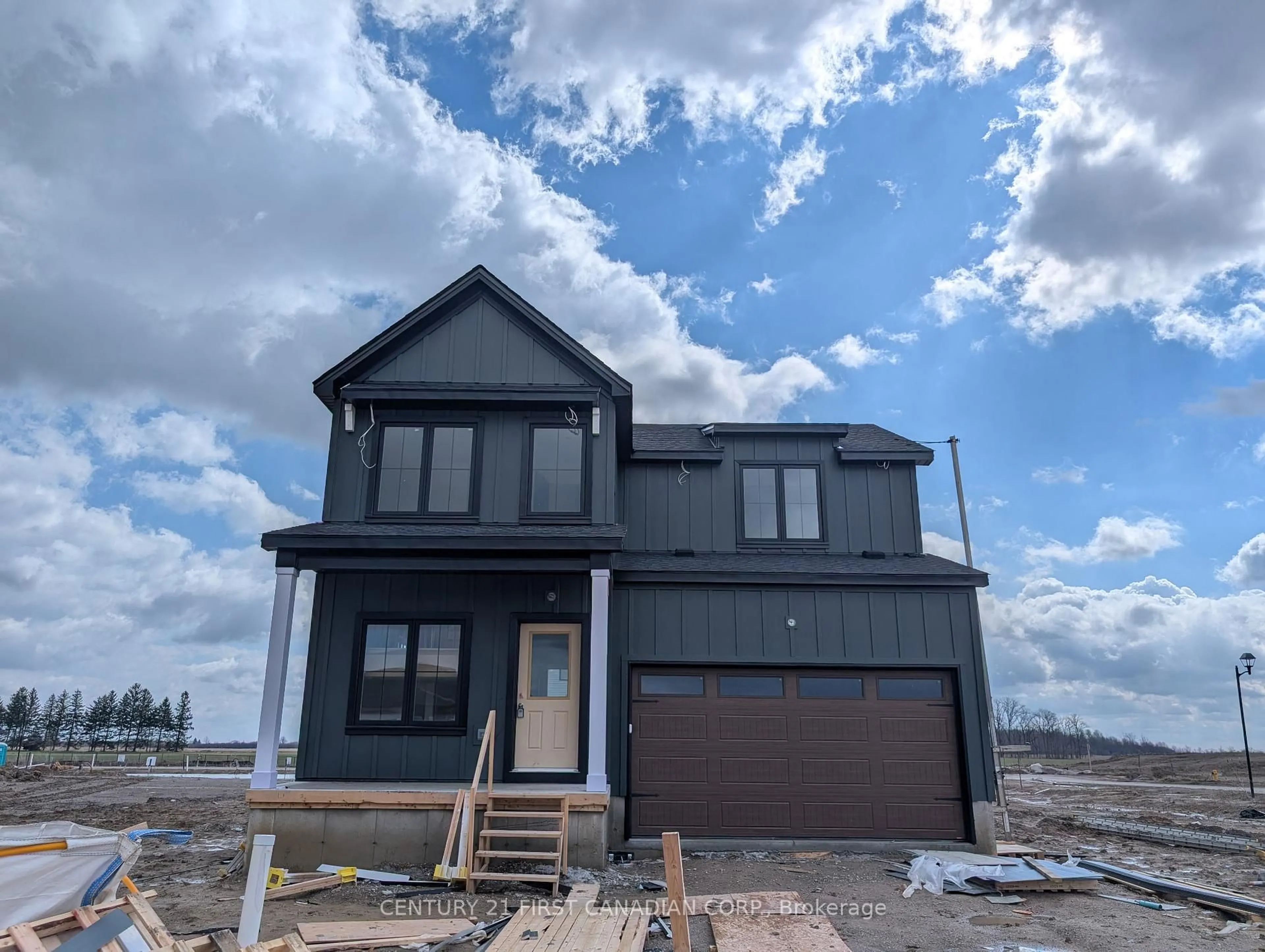 Home with vinyl exterior material, street for 30 Sheldabren St, North Middlesex Ontario N0M 1A0