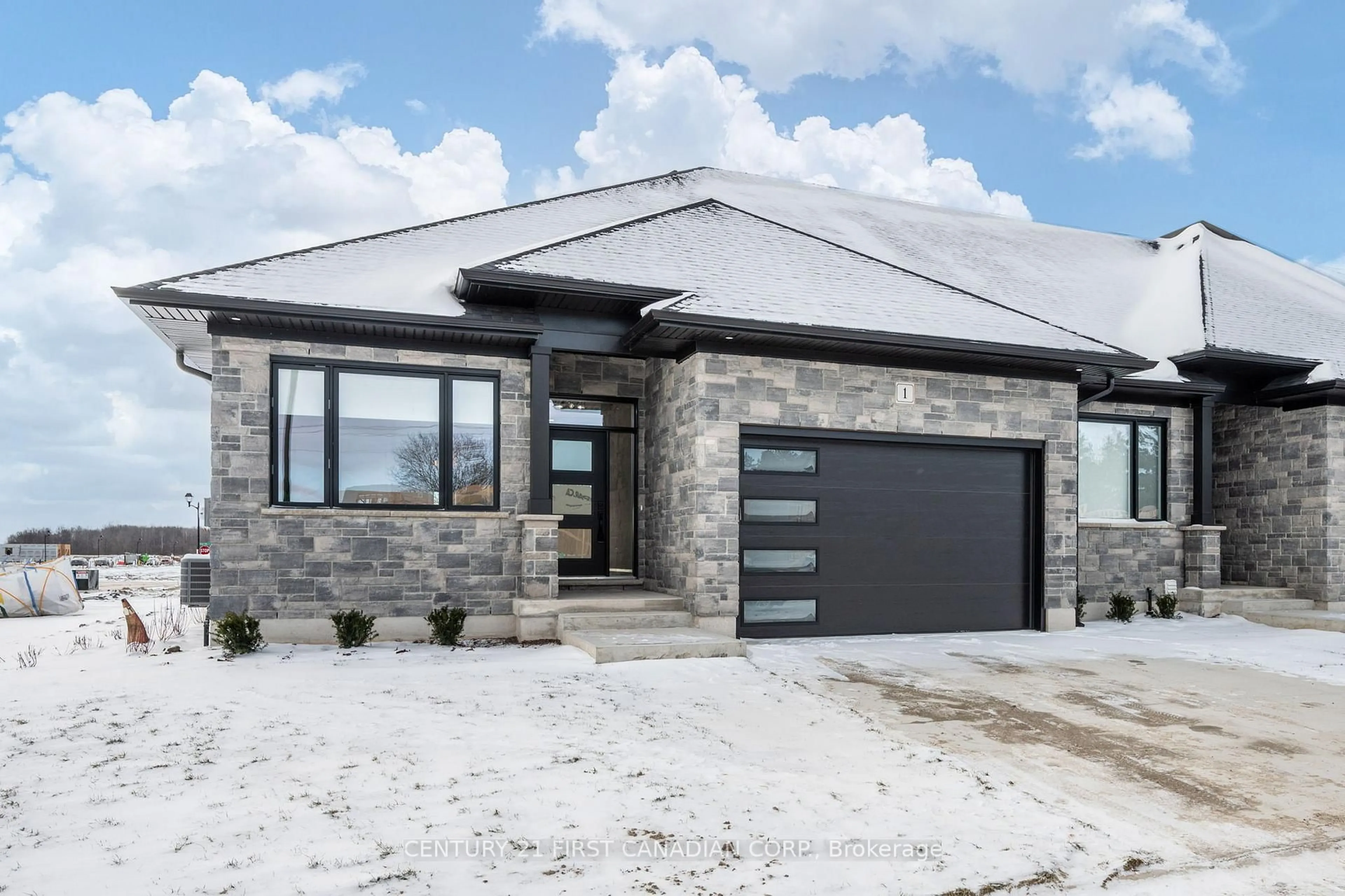 Home with brick exterior material, street for 32 Postma Cres #11, North Middlesex Ontario N0M 1A0