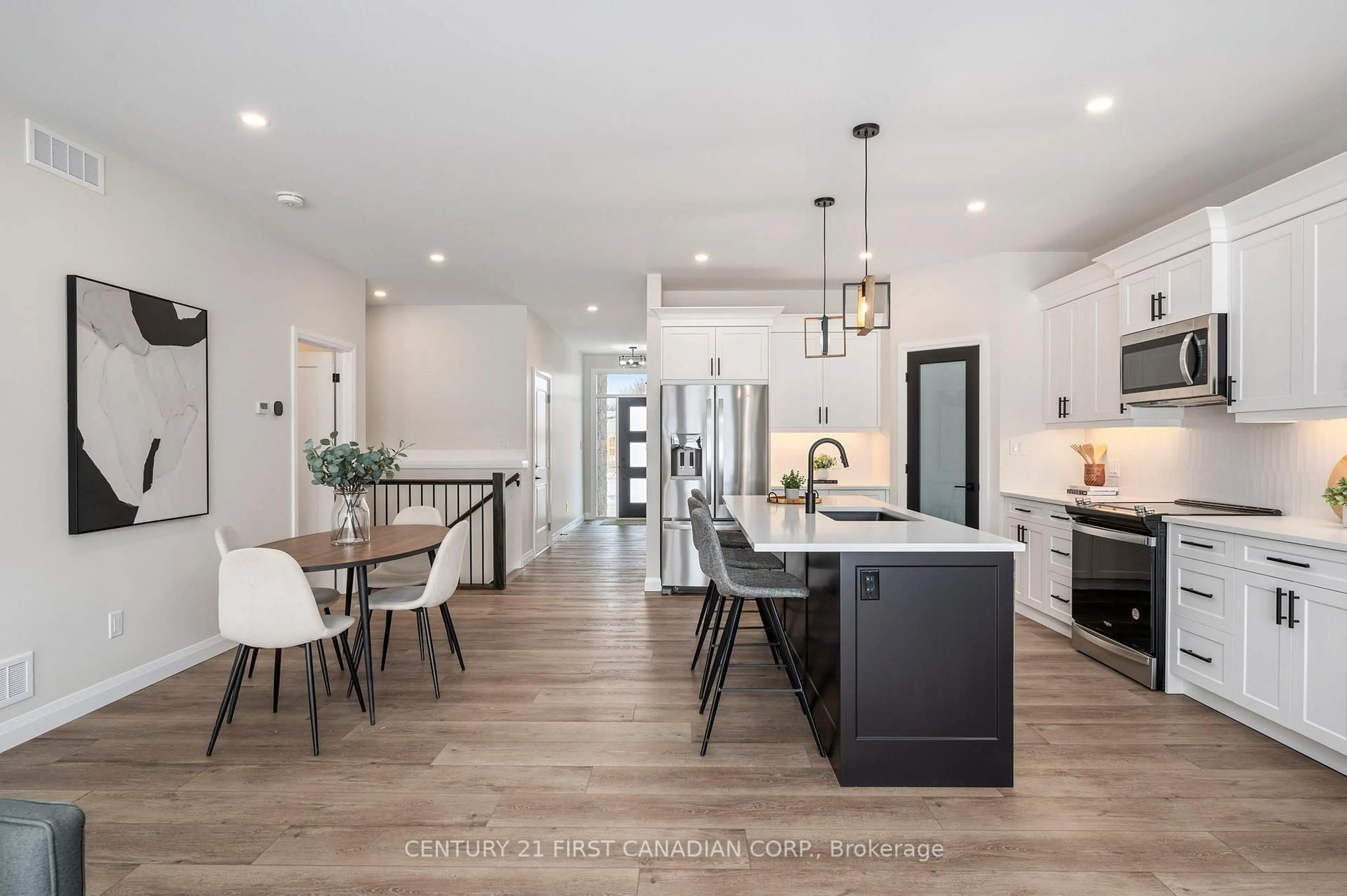 Open concept kitchen, unknown for 32 Postma Cres #11, North Middlesex Ontario N0M 1A0