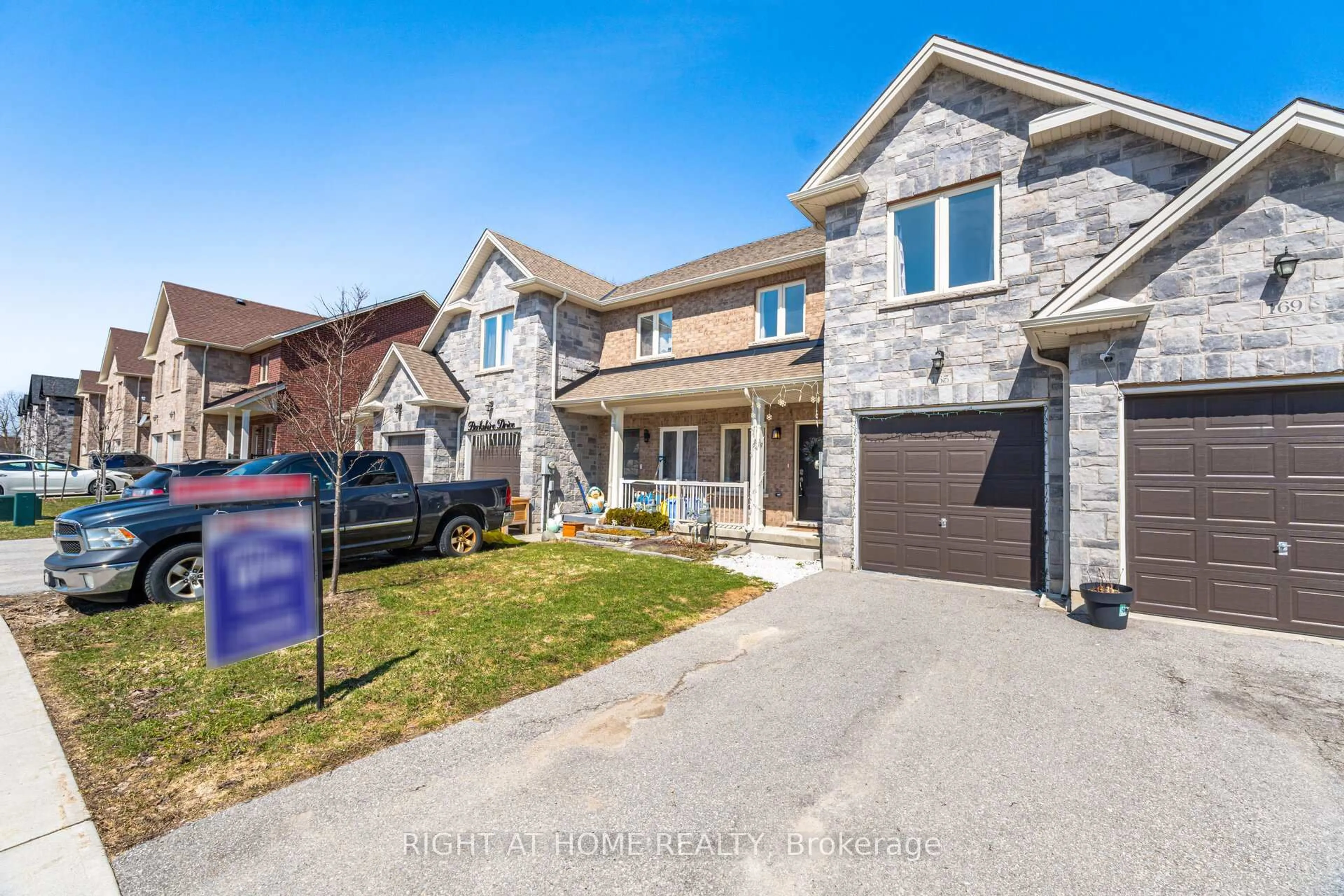 Home with brick exterior material, street for 165 Berkshire Dr, Wellington North Ontario N0G 1A0