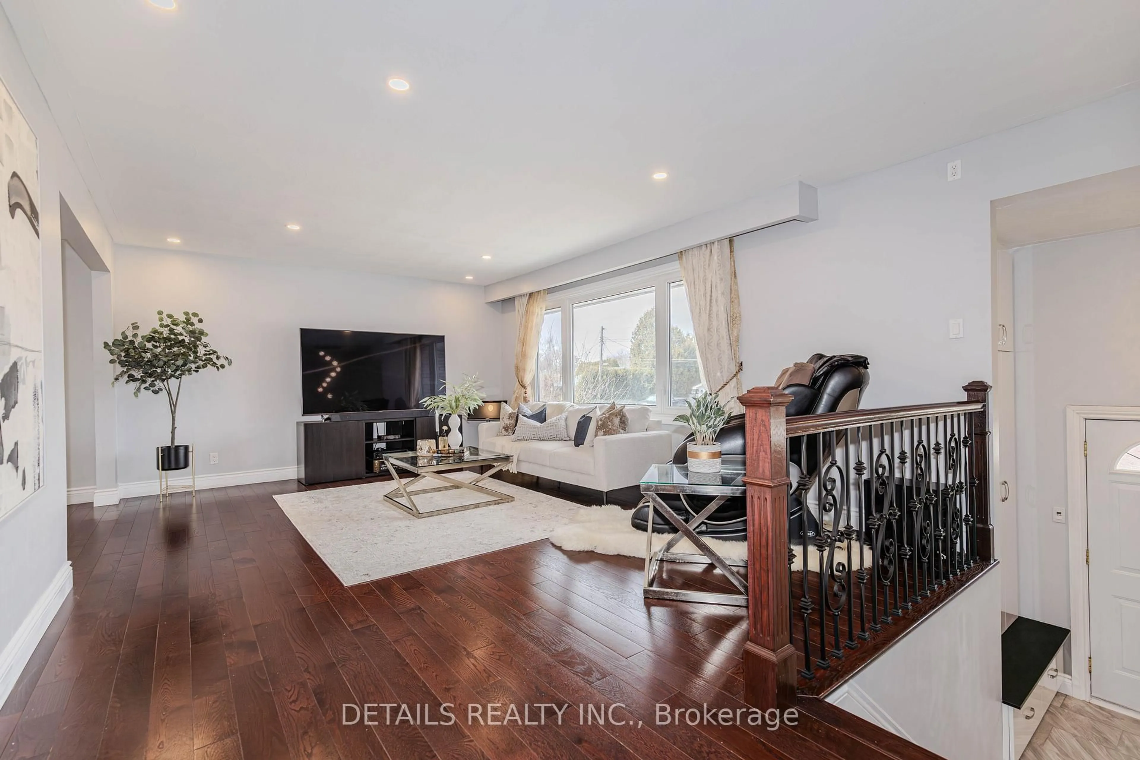 Living room with furniture, wood/laminate floor for 7 Kerry Cres, Ottawa Ontario K2E 5V7