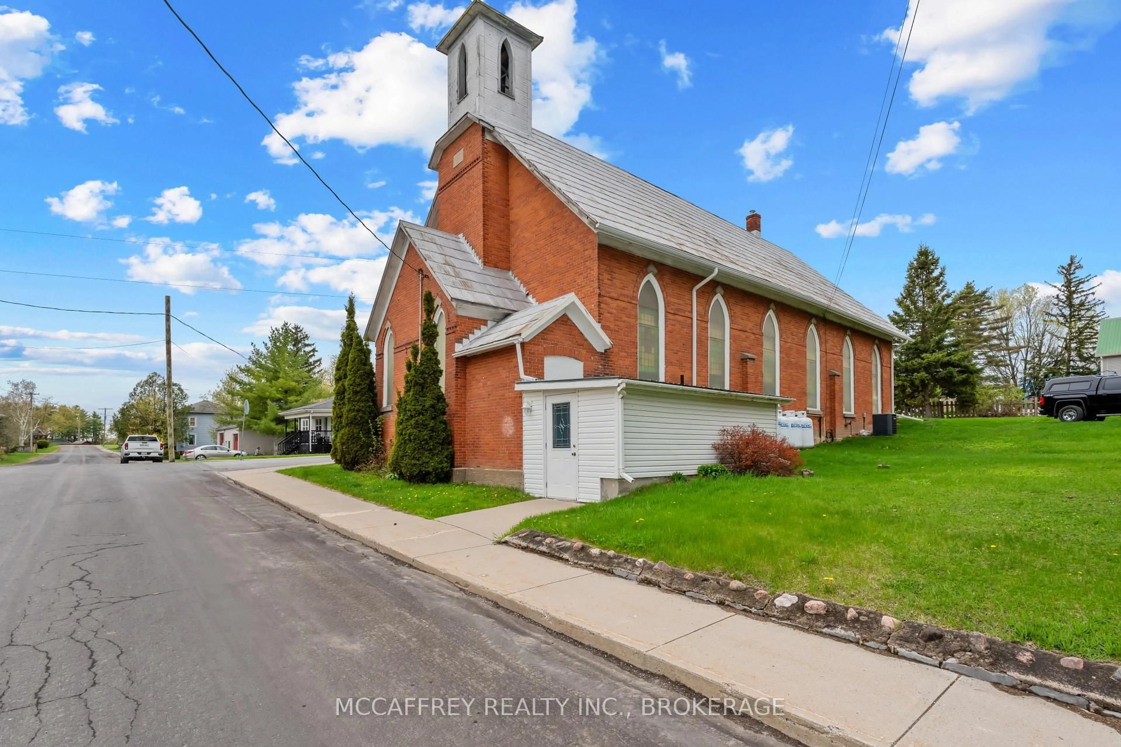 A pic from outside/outdoor area/front of a property/back of a property/a pic from drone, street for 4 Neely St, Tamworth Ontario K0K 3G0