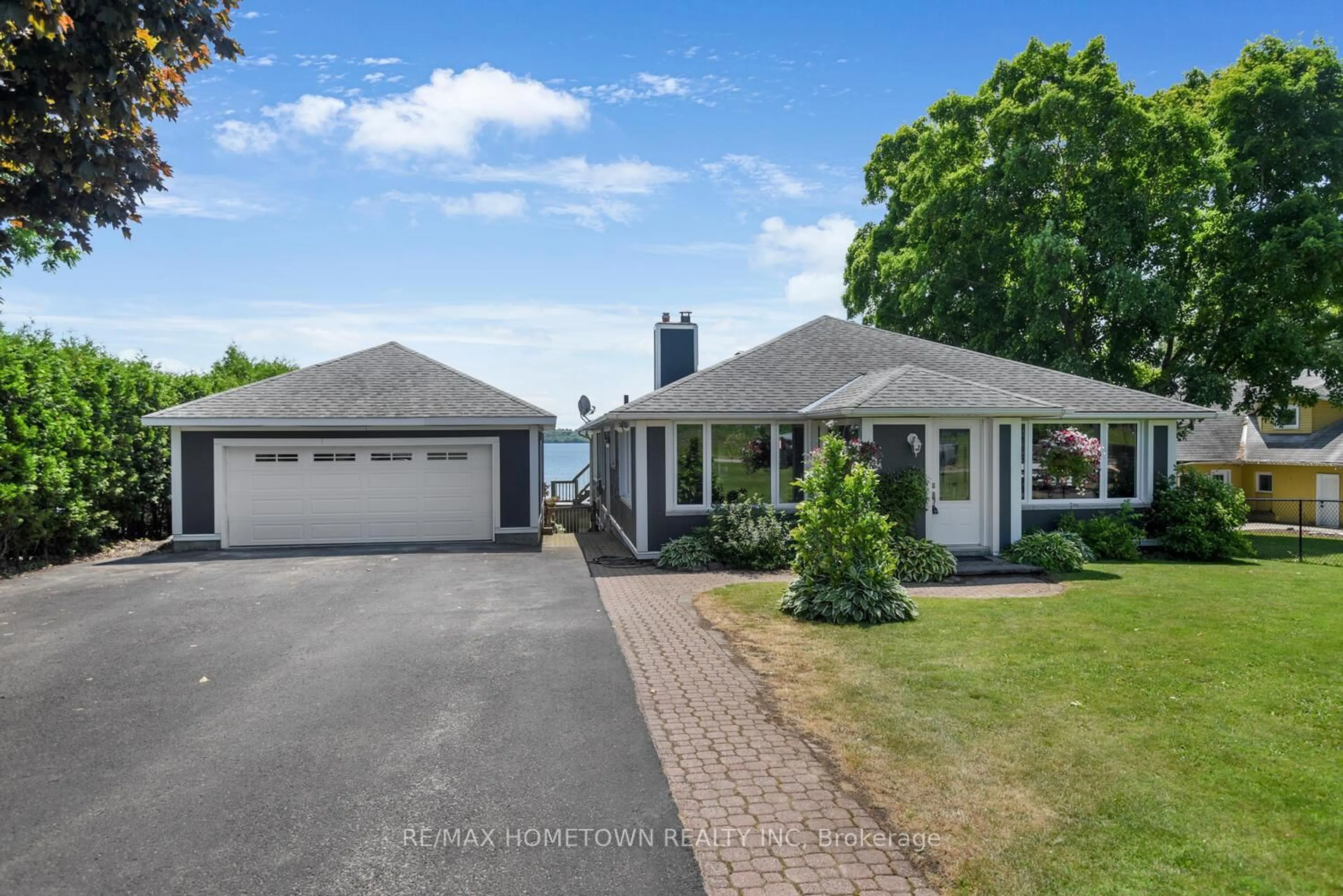 A pic from outside/outdoor area/front of a property/back of a property/a pic from drone, water/lake/river/ocean view for 1643 County Road 2 Rd, Augusta Ontario K0E 1T0