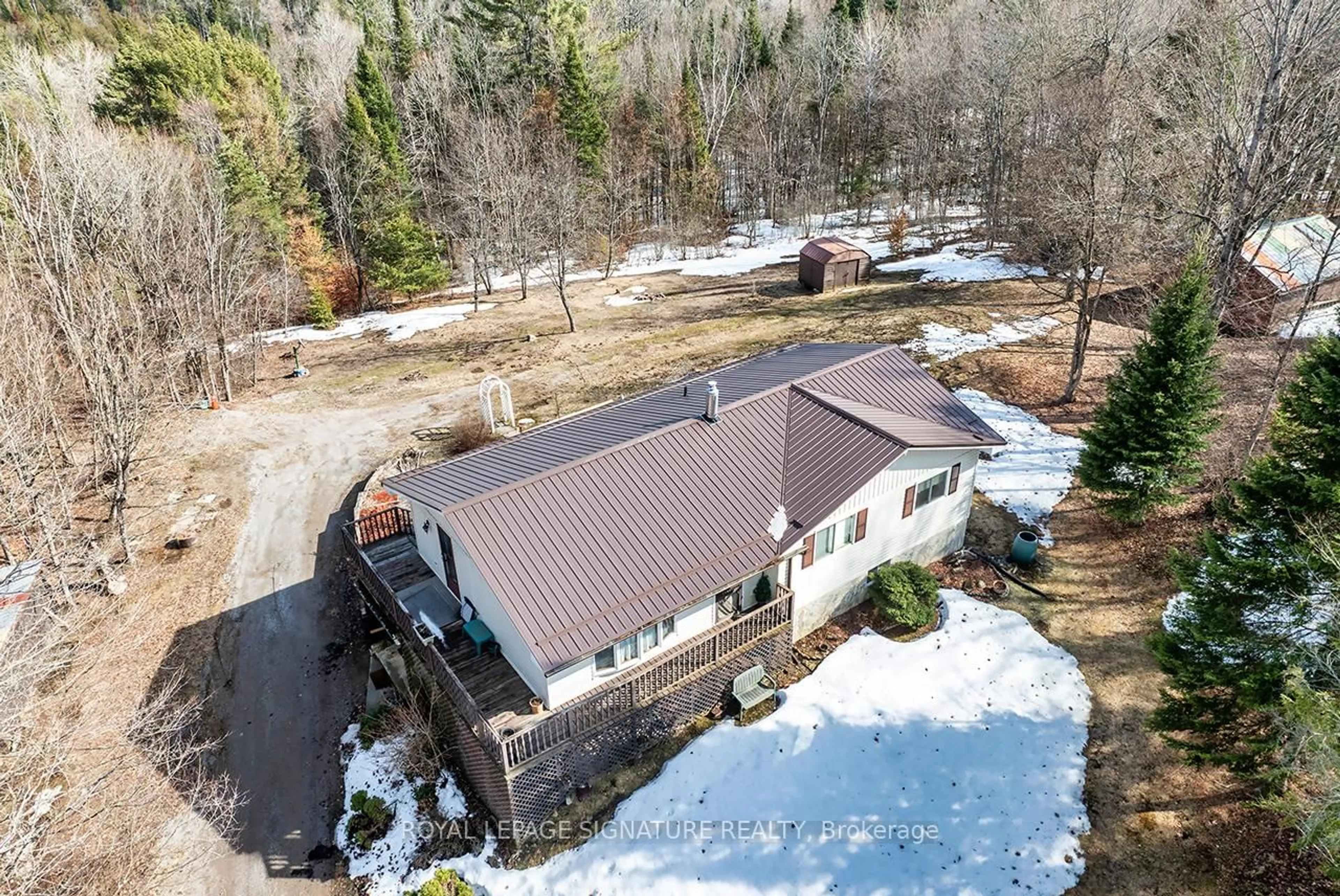 A pic from outside/outdoor area/front of a property/back of a property/a pic from drone, unknown for 1928 Irondale Rd, Highlands East Ontario K0M 1X0