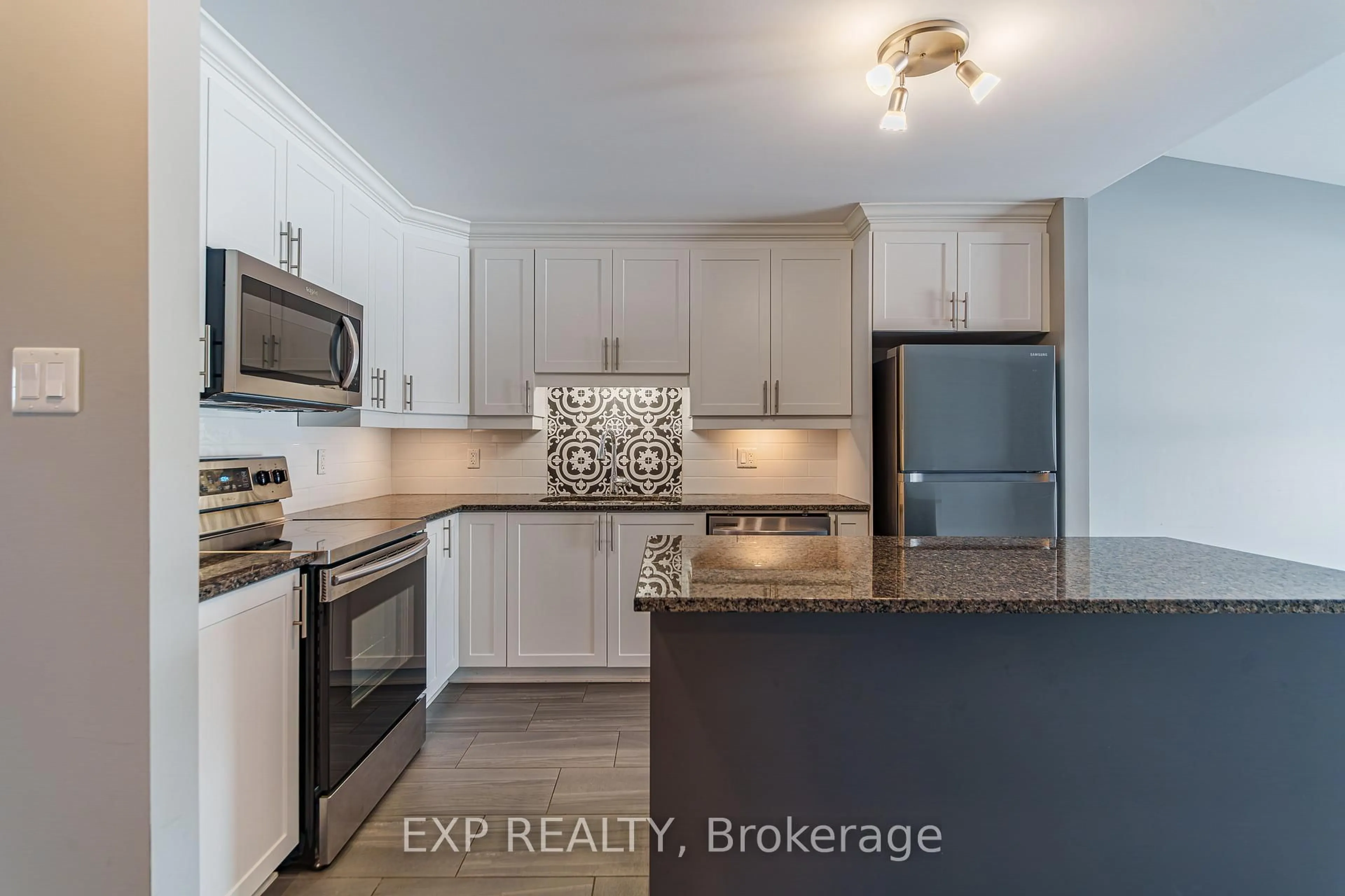 Open concept kitchen, ceramic/tile floor for 306 Masters Lane #285, Clarence-Rockland Ontario K4K 0L3