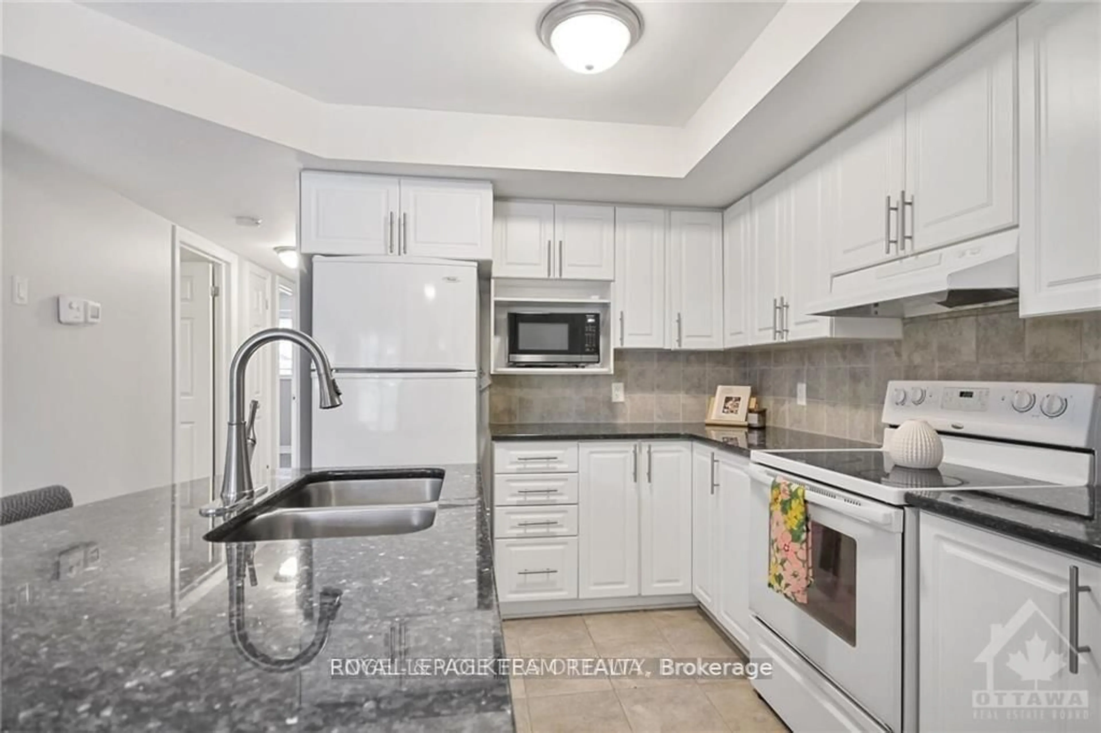 Standard kitchen, ceramic/tile floor for 46 Barnstone Dr #2, Ottawa Ontario K2G 4R6