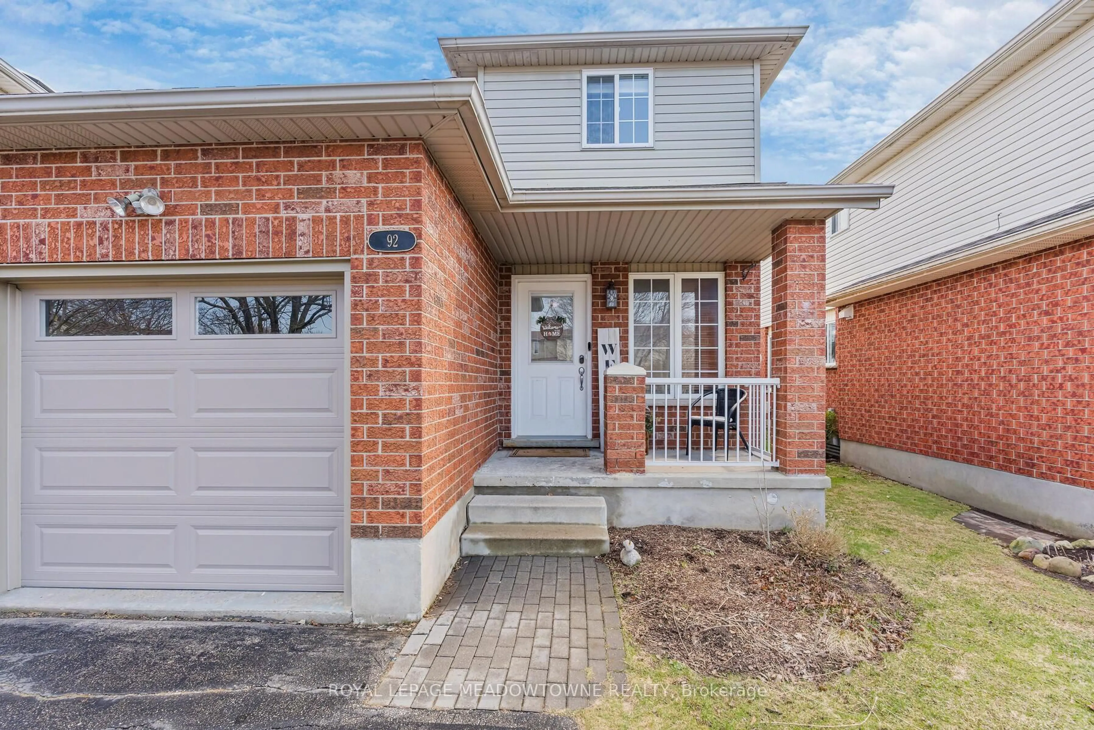 Home with brick exterior material, street for 92 Hill Tr, Guelph Ontario N1E 7C9