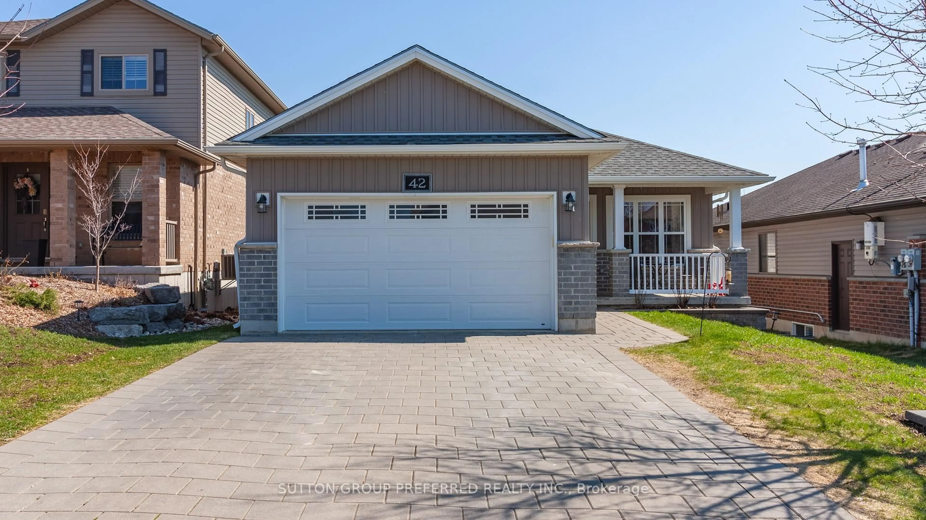 Home with vinyl exterior material, street for 42 Leesboro Tr, Thames Centre Ontario N0M 2P0