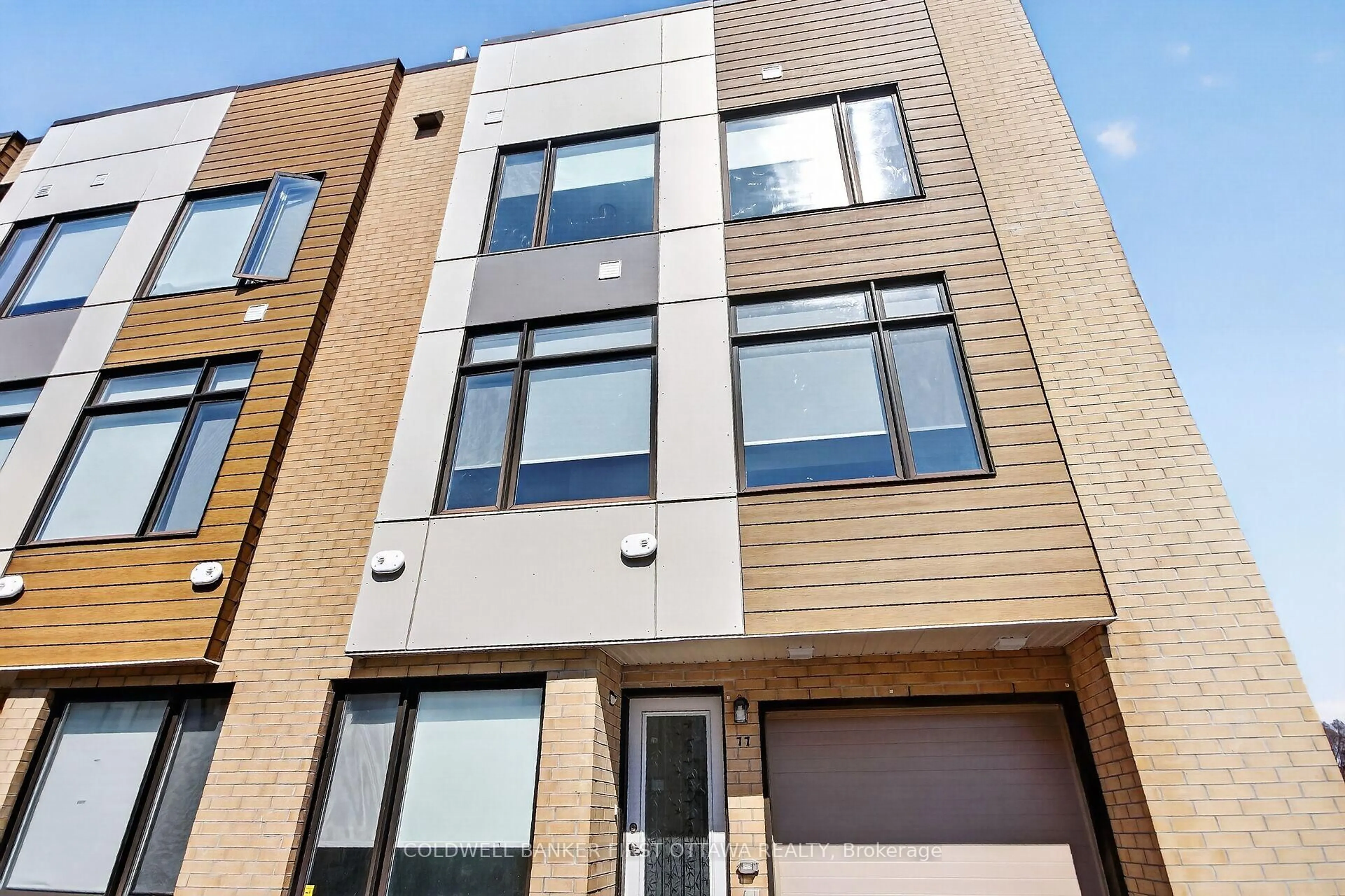 Home with brick exterior material, street for 77 Cherry Blossom Private, Ottawa Ontario K2H 6Z9