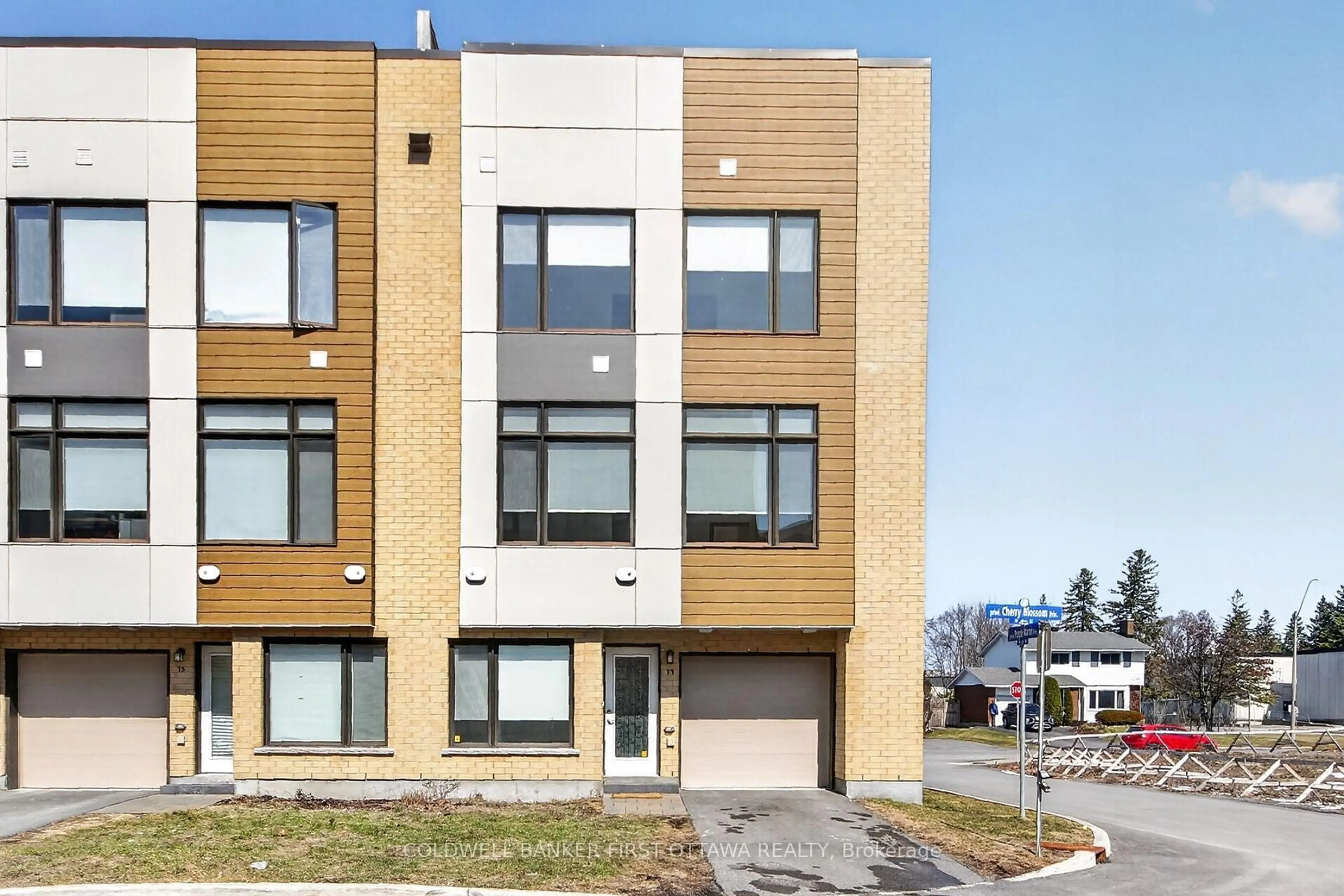 Home with brick exterior material, street for 77 Cherry Blossom Private, Ottawa Ontario K2H 6Z9