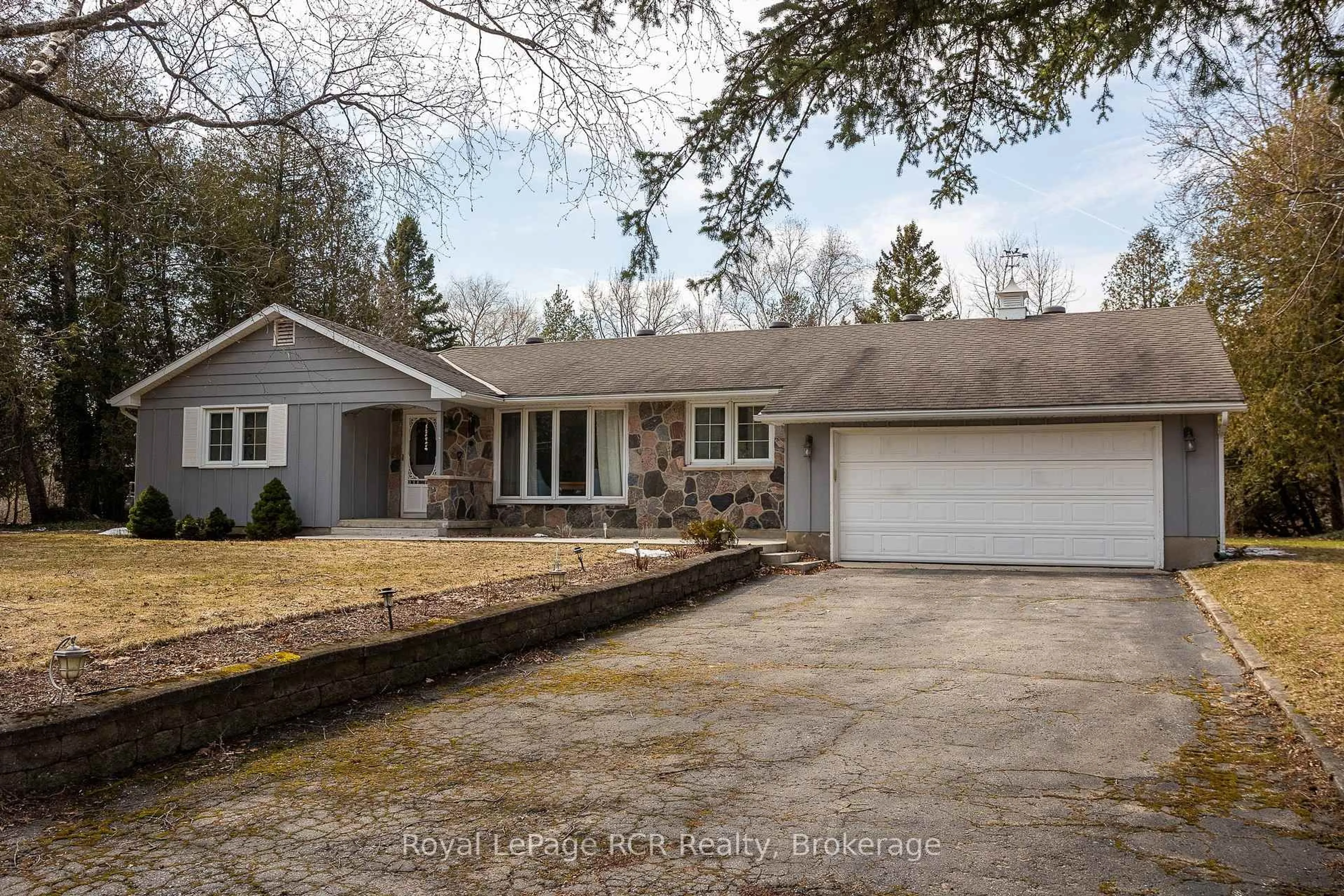 A pic from outside/outdoor area/front of a property/back of a property/a pic from drone, street for 406 Balmy Beach Rd, Georgian Bluffs Ontario N4K 5N4
