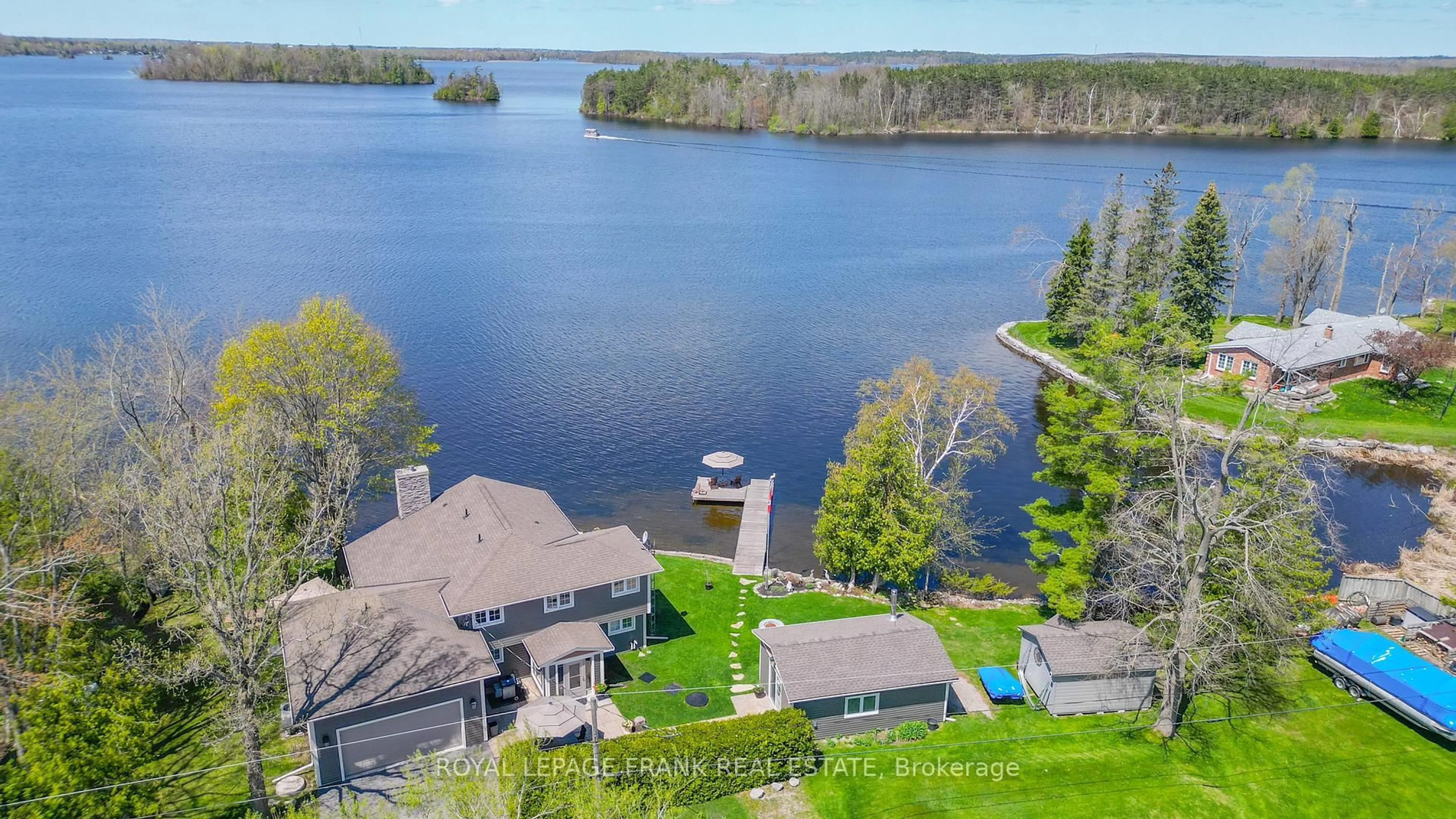 A pic from outside/outdoor area/front of a property/back of a property/a pic from drone, water/lake/river/ocean view for 11 EDGEWATER Dr, Selwyn Ontario K0L 1T0