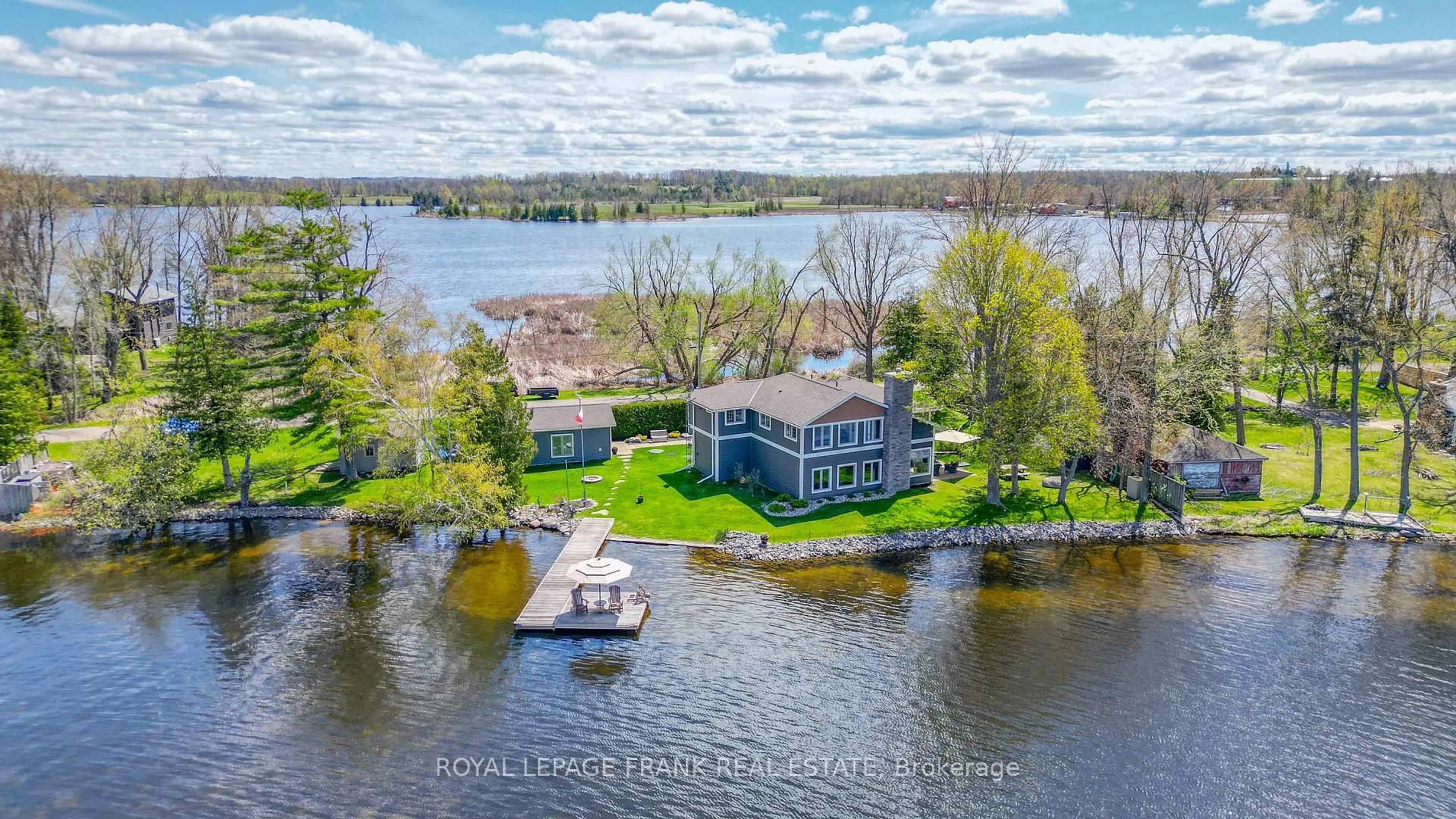 A pic from outside/outdoor area/front of a property/back of a property/a pic from drone, water/lake/river/ocean view for 11 EDGEWATER Dr, Selwyn Ontario K0L 1T0