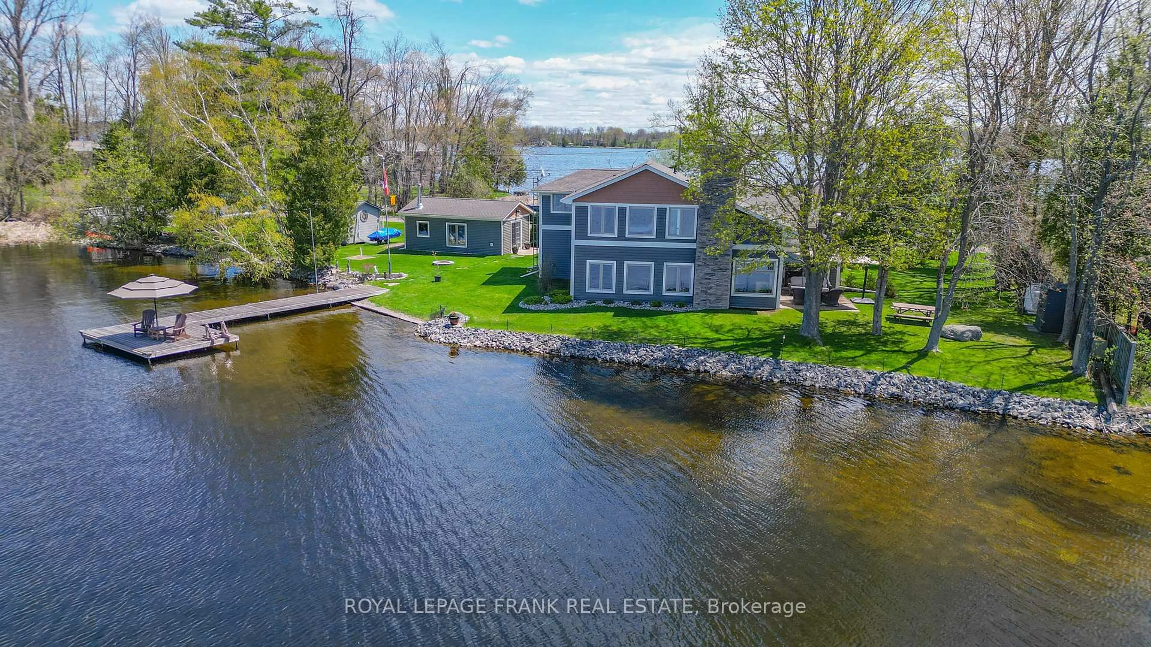 A pic from outside/outdoor area/front of a property/back of a property/a pic from drone, water/lake/river/ocean view for 11 EDGEWATER Dr, Selwyn Ontario K0L 1T0